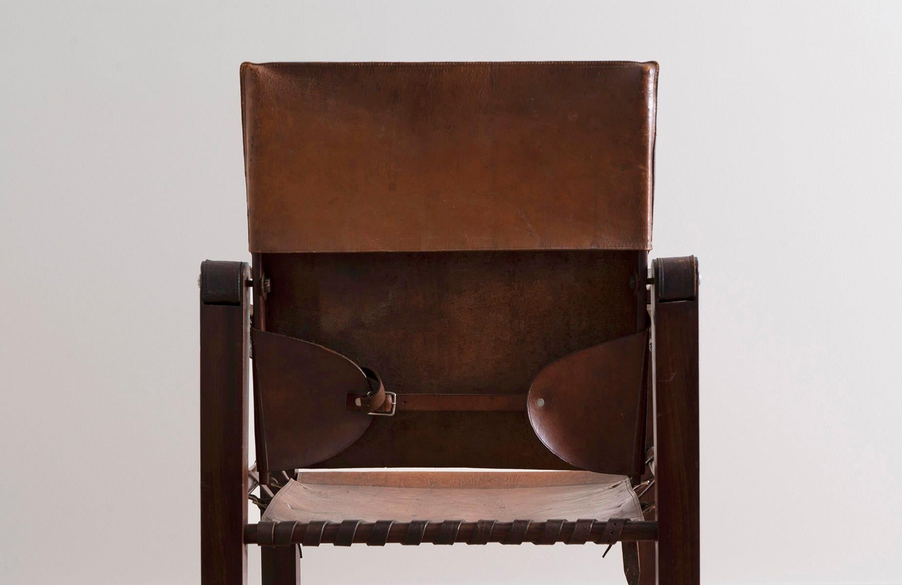 Leather Campaign Safari-style Armchair In Fair Condition In Brooklyn, NY