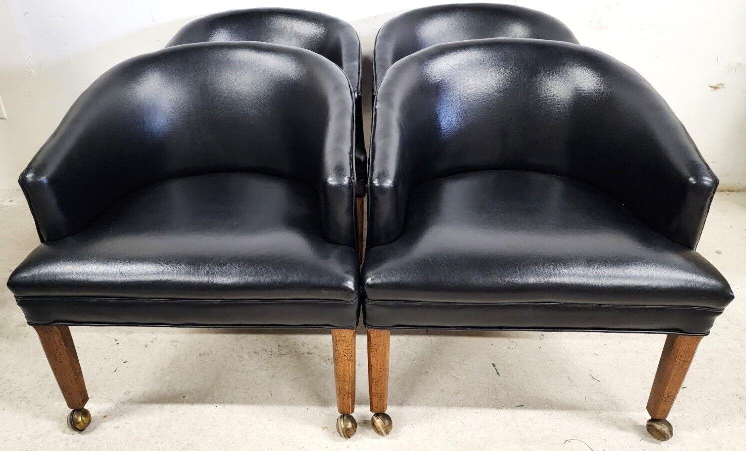 Offering One Of Our Recent Palm Beach Estate Fine Furniture Acquisitions Of A 
Set of 4 MCM Black Leather Game Dining Chairs Rolling 

Approximate Measurements in Inches
27