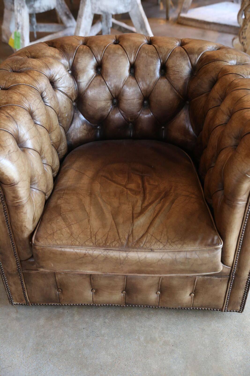 This Chesterfield chair brings a timeless sophistication to any sitting space with it’s cushioned leather seat, tufted upholstery, and roll arms. As comfortable as it is enticing, this piece is sure to be a favorite in any space.
 
