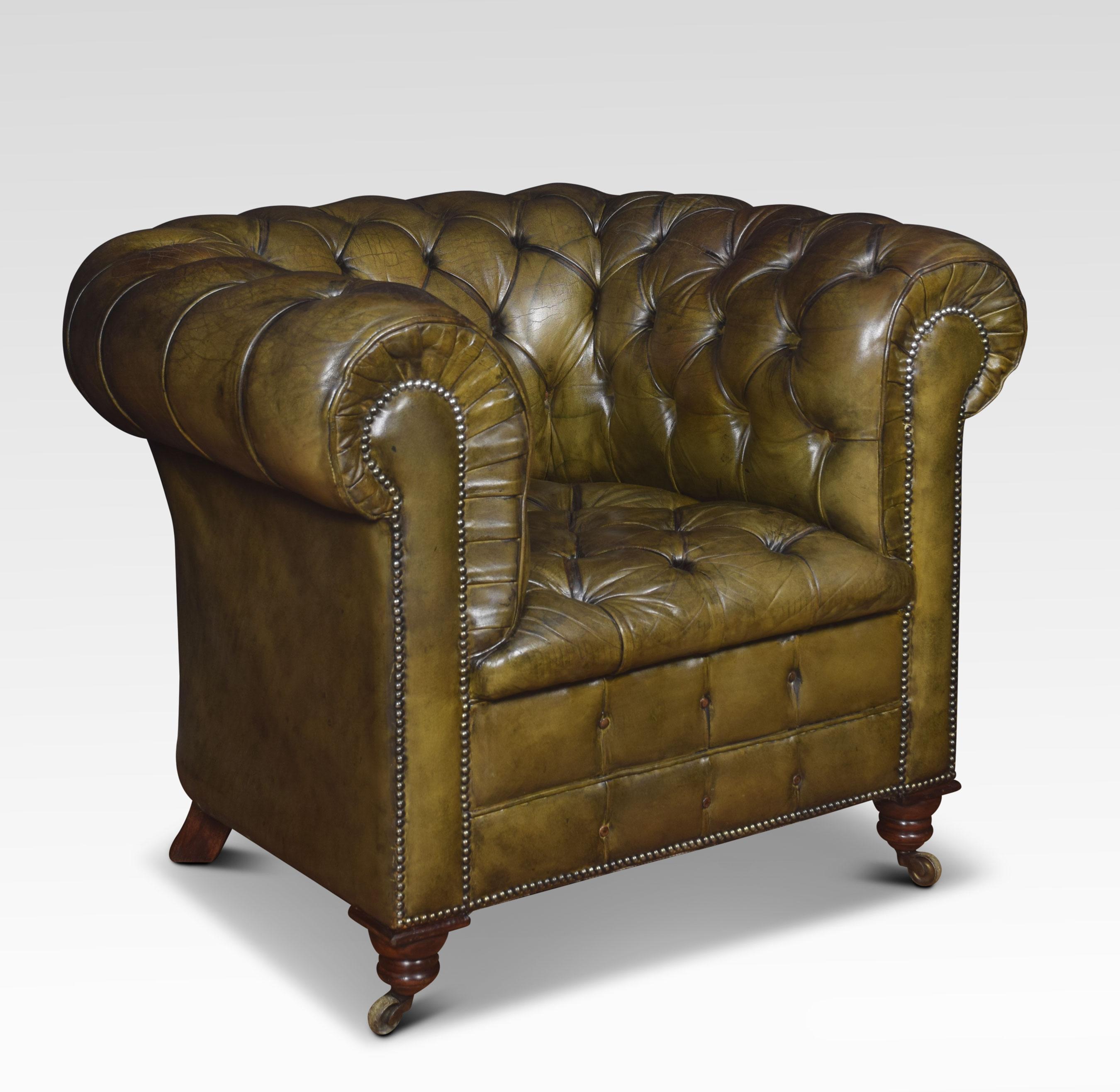 Leather Chesterfield club chair, having deep buttoned back and seat, raised up on turned feet with brass castors. Good solid condition, the leather is soft, nicely worn in.
Dimensions:
Height 33 inches, height to seat 19.5 inches
Width 41.5