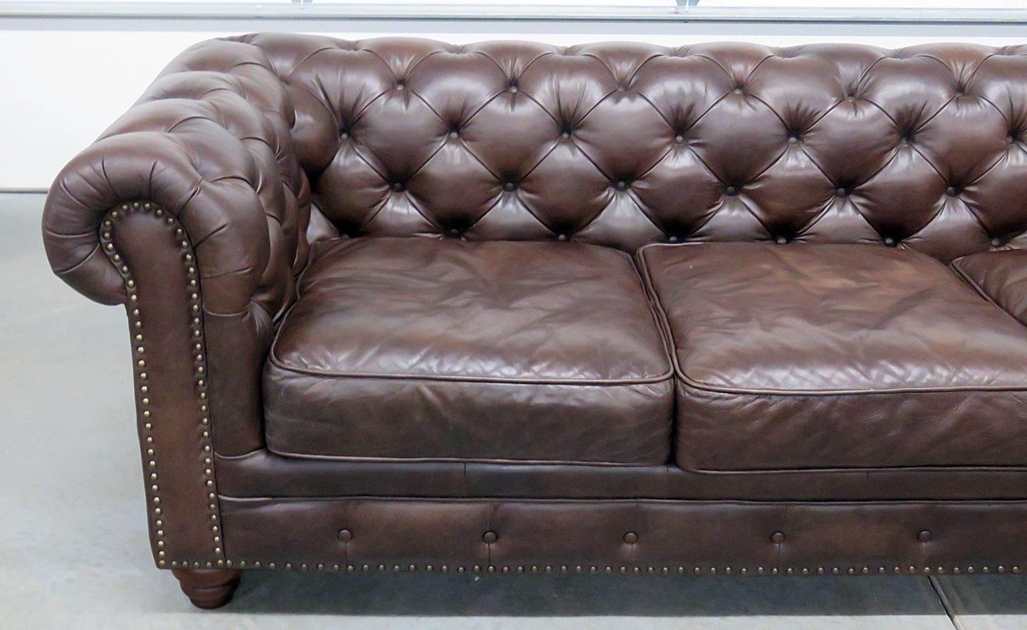 Tufted leather Chesterfield sofa with nailhead trim, attributed to Restoration Hardware.