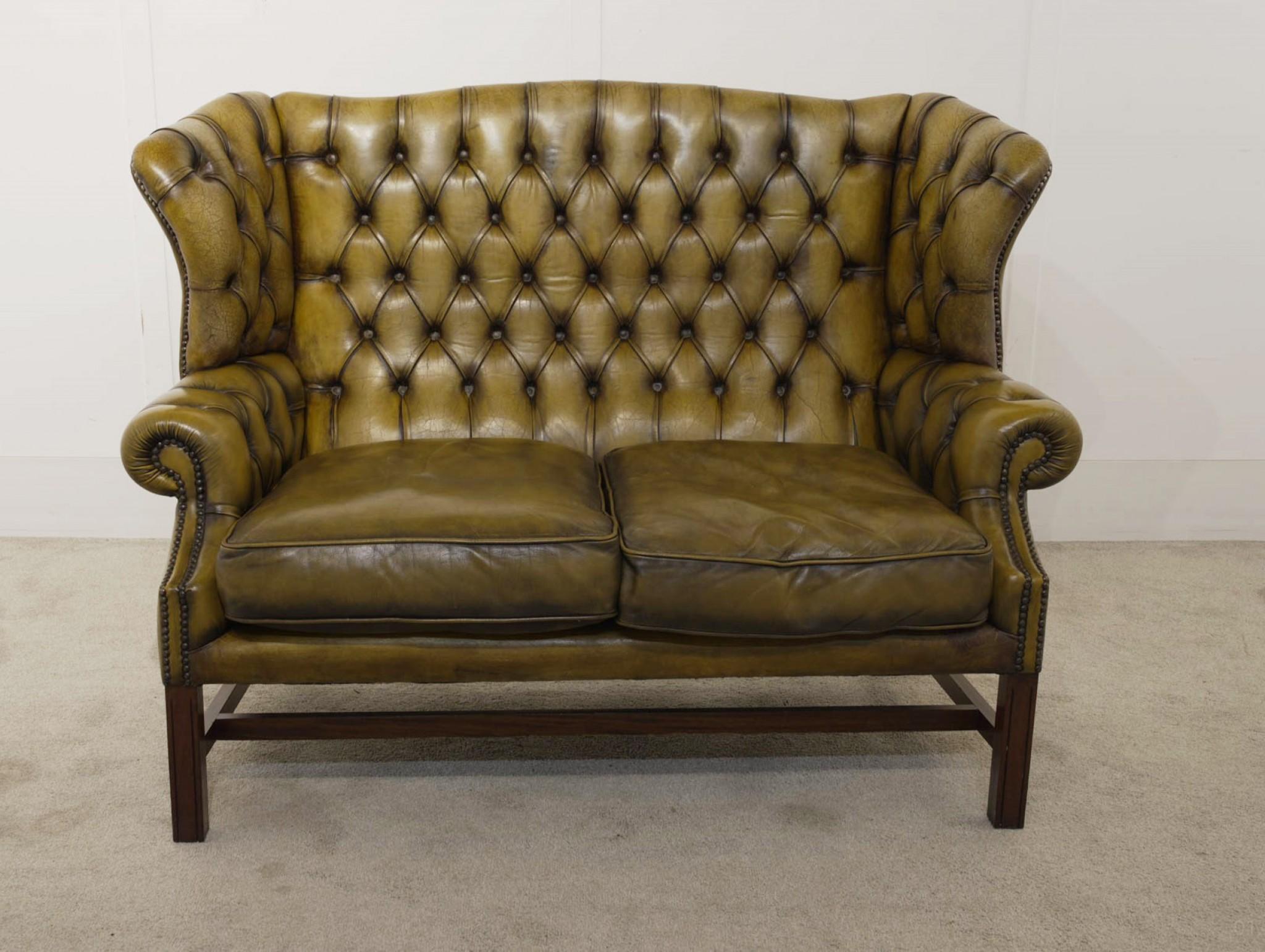 You are viewing a gorgeous green leather double Chesterfield sofa
Classic deep button seat with high backs, very comfortable to sit in
Bought from a private house sale in London’s Knightsbridge
Circa Date 1920
Offered in great shape and will ship to