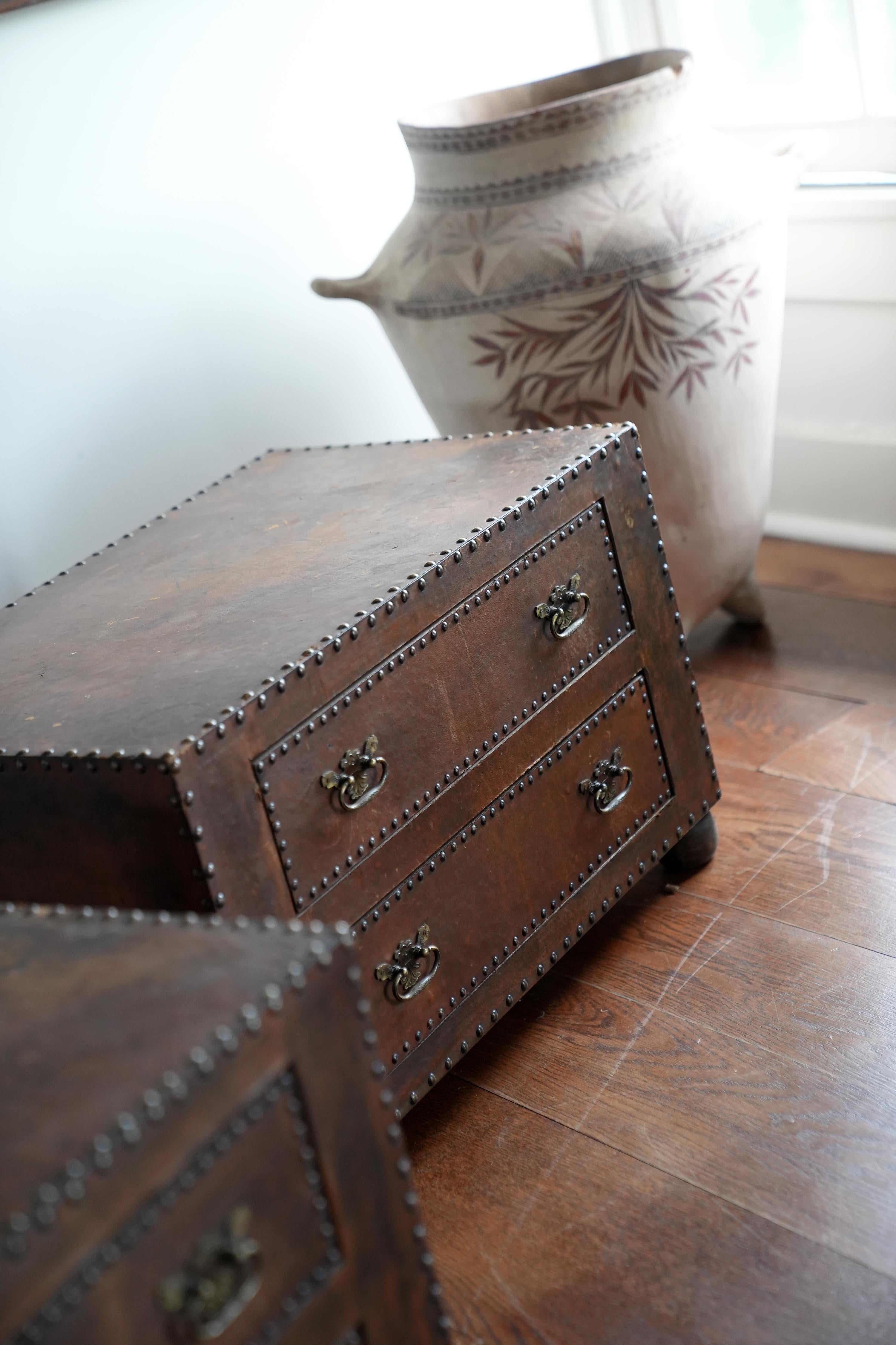 Studded leather clad chests 1