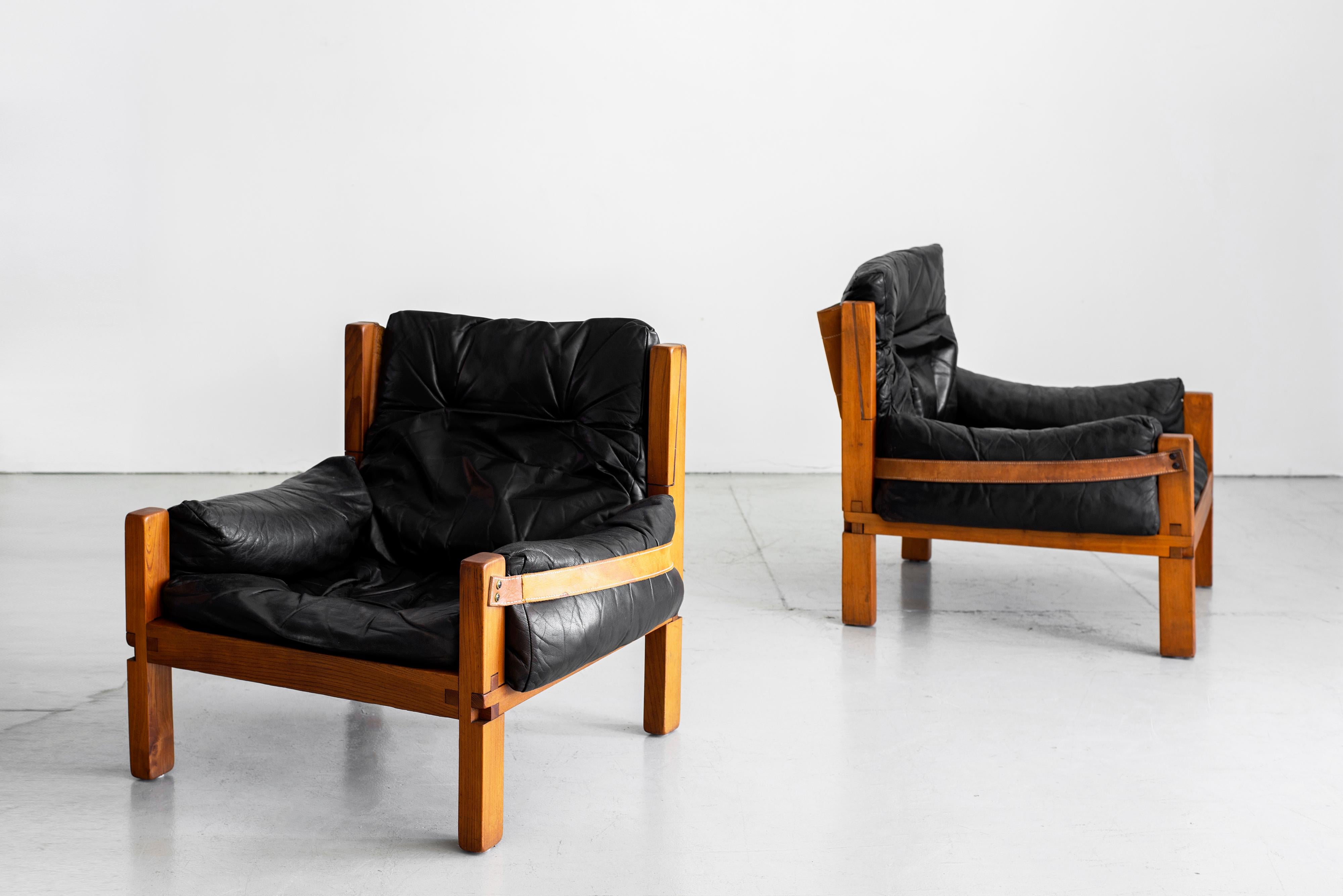 Fantastic pair of leather club chairs designed by French designer Pierre Chapo, model 