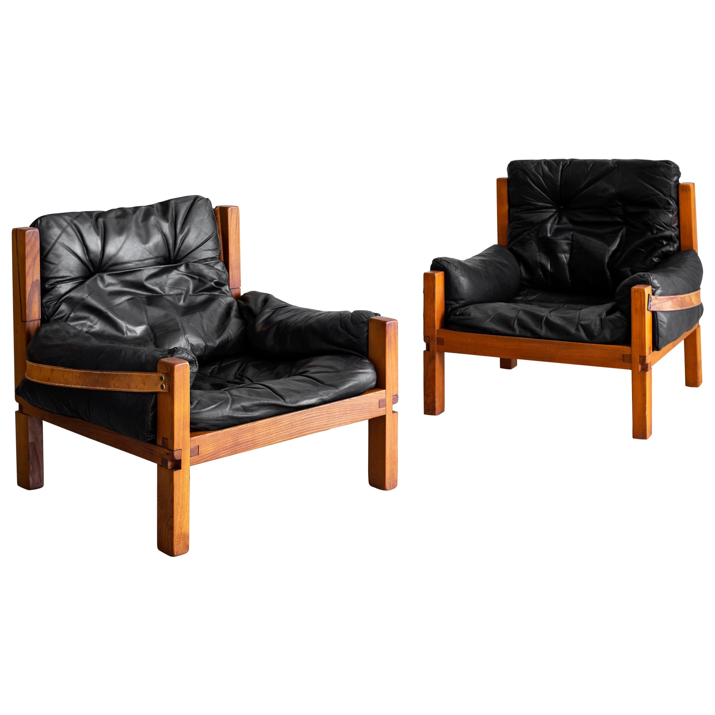 Leather Club Chairs by Pierre Chapo