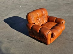 1 of 4 Leather Club Chairs done in cognac leather, Italy 1970s