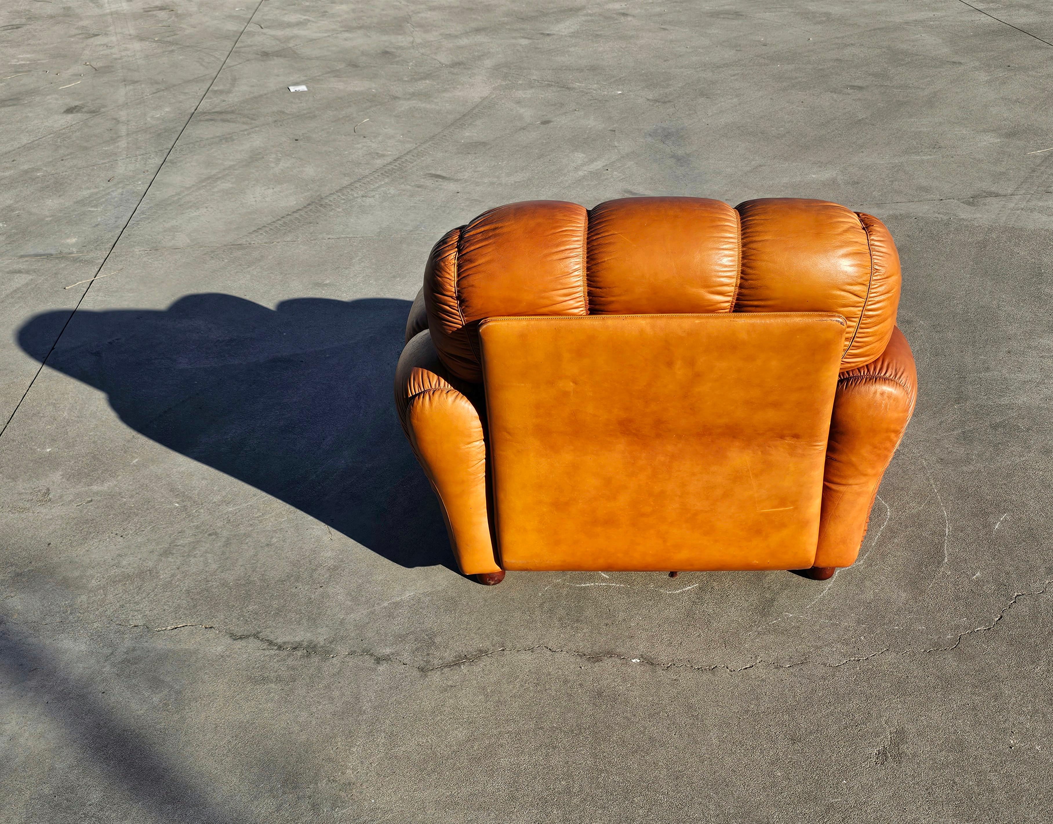 Late 20th Century 1 of 4 Leather Club Chairs done in cognac leather, Italy 1970s For Sale