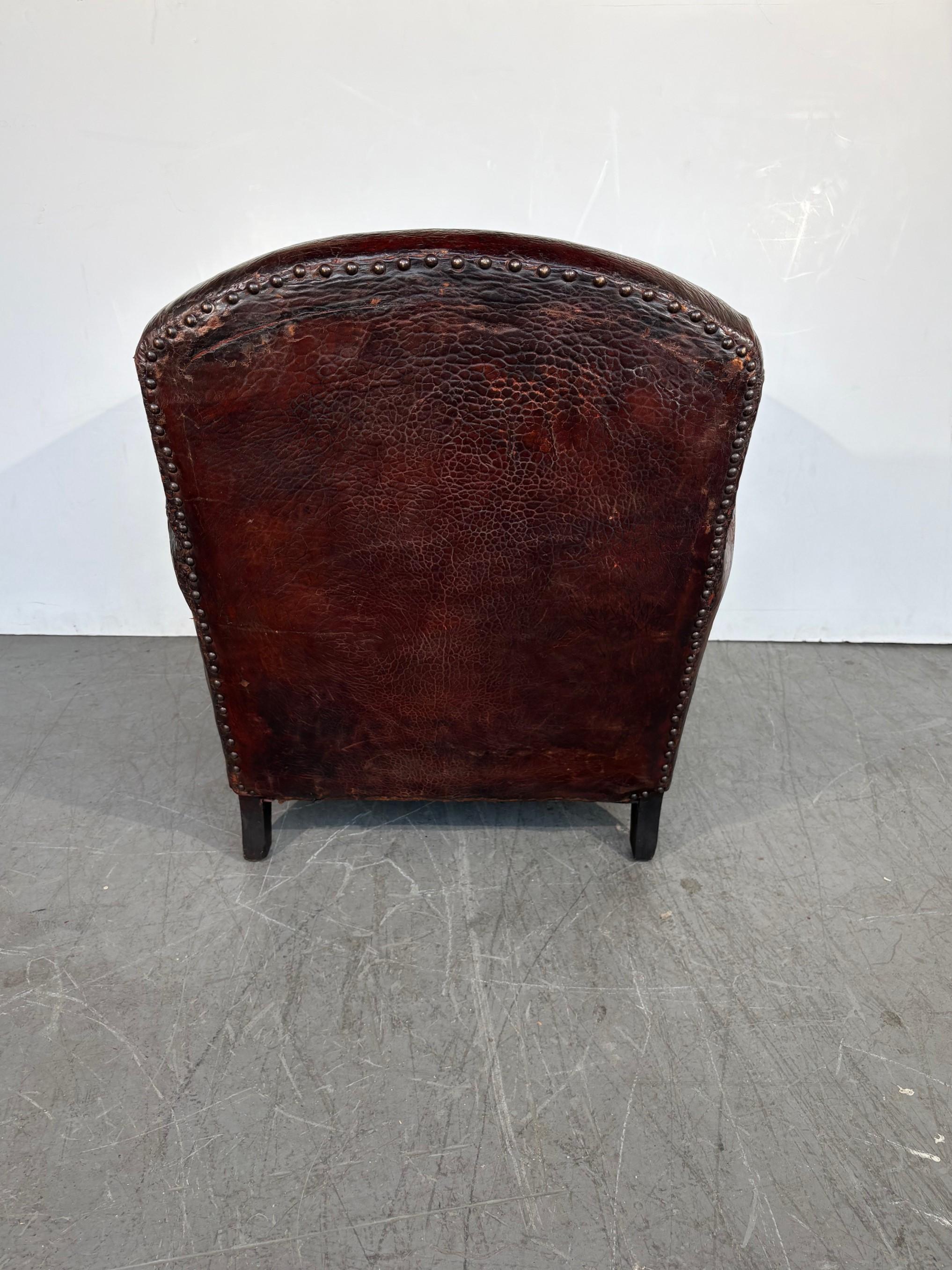 A pair of French club chairs. 