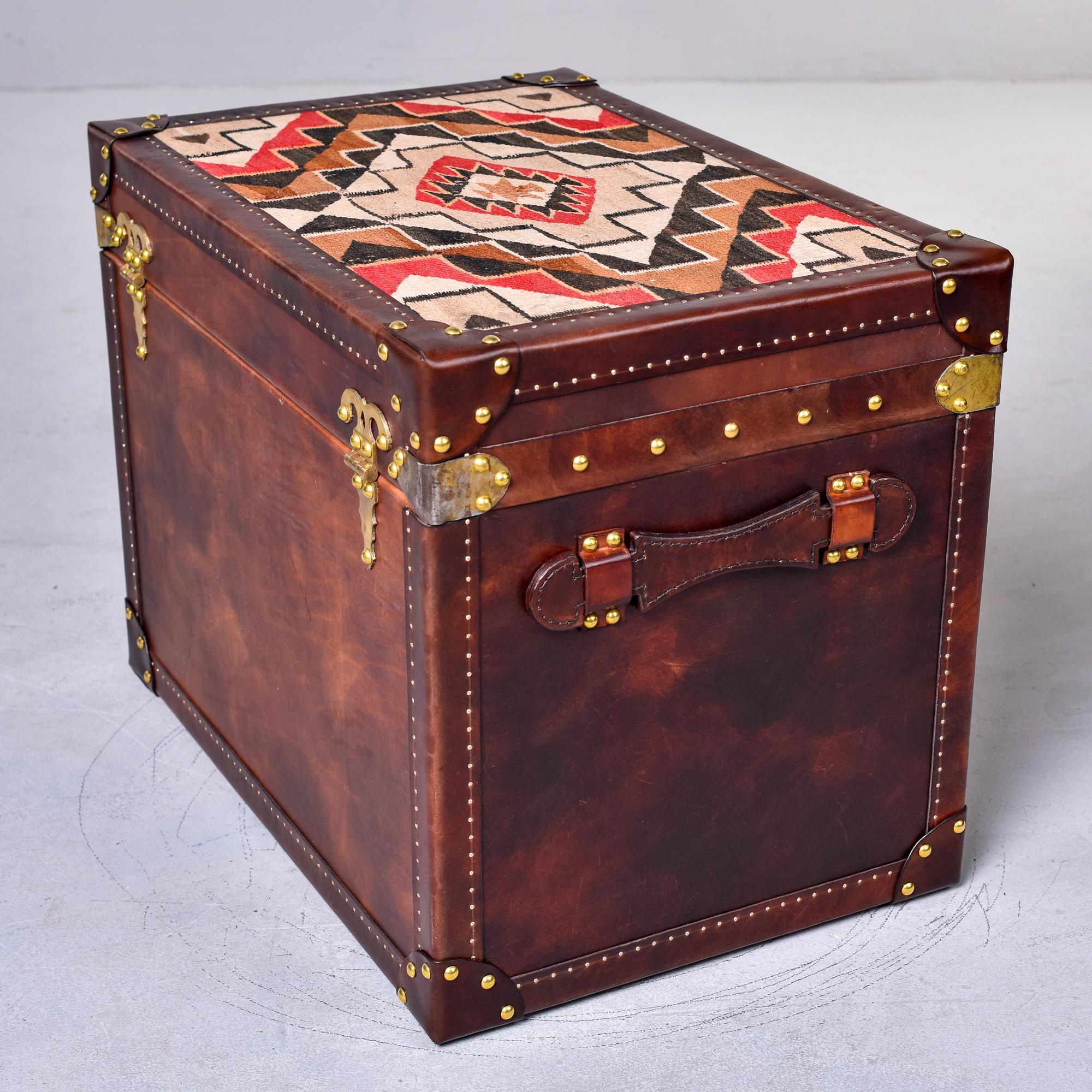 American Leather Covered Trunk with Vintage Hardware and Kilim on Top Panel For Sale