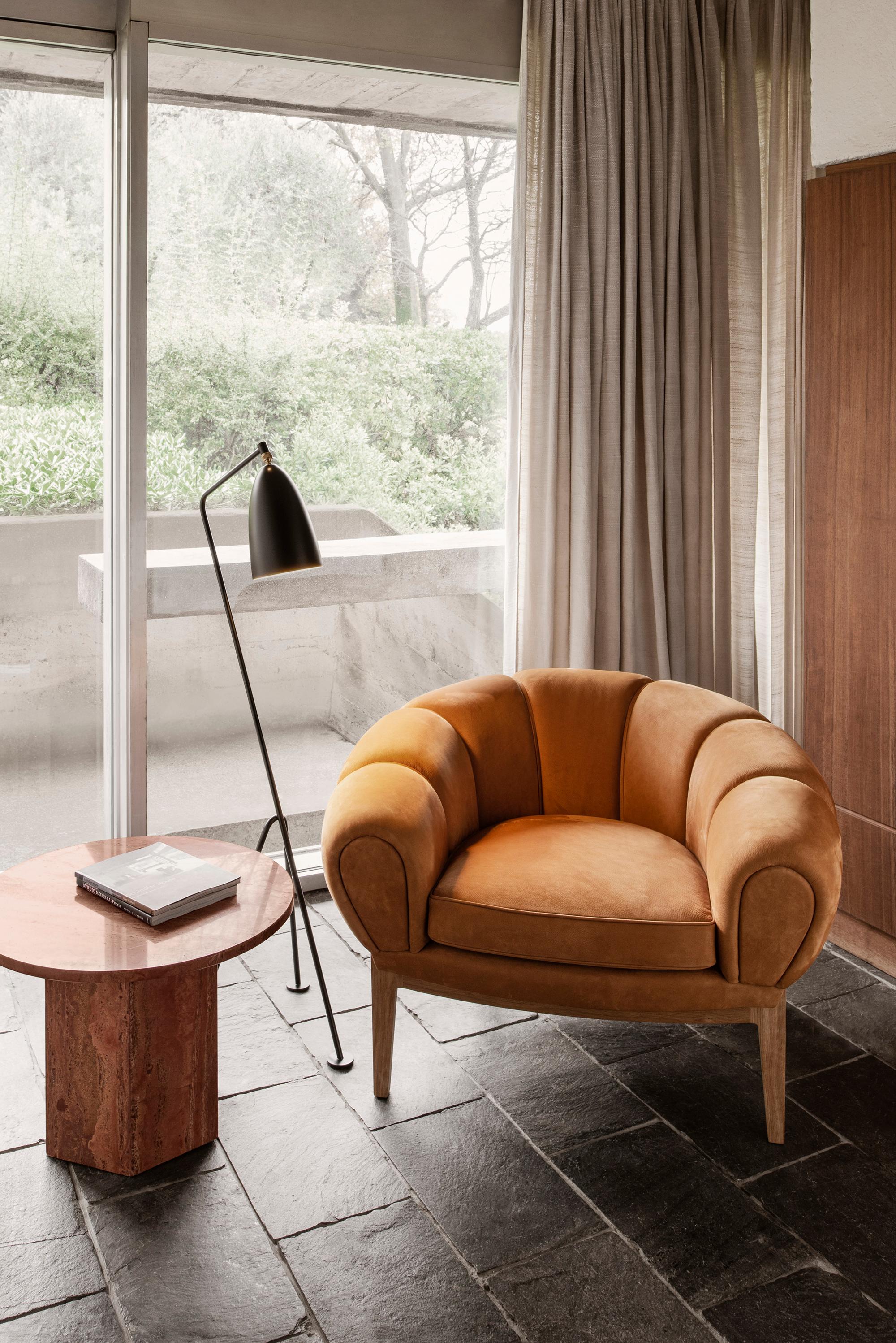 Leather 'Croissant' lounge chair by Illum Wikkelsø for GUBI.

Playful, voluptuous and expertly crafted, the newly reimagined Croissant Collection from GUBI makes a powerful statement in any interior setting and an heirloom to treasure for