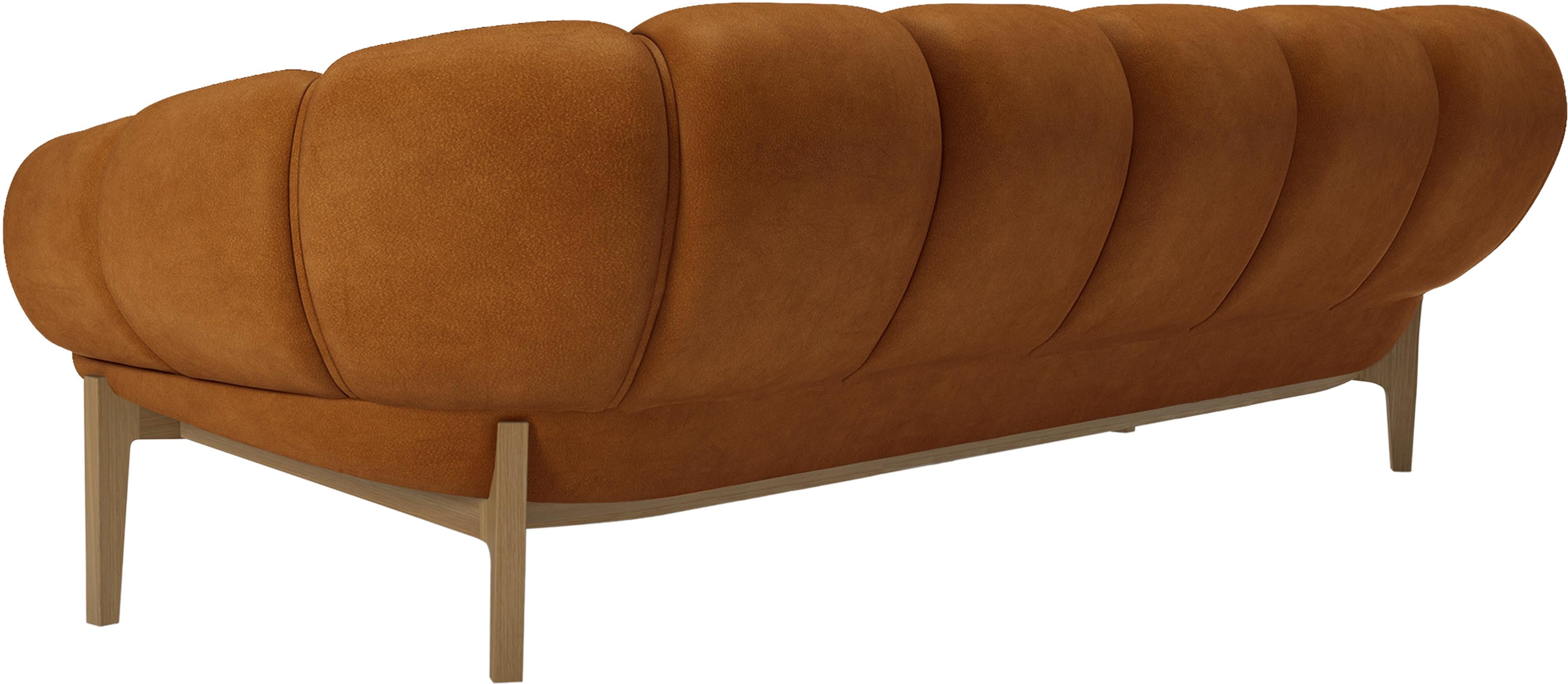 Mid-Century Modern Leather 'Croissant' Sofa by Illum Wikkelsø for Gubi with Oak Legs For Sale