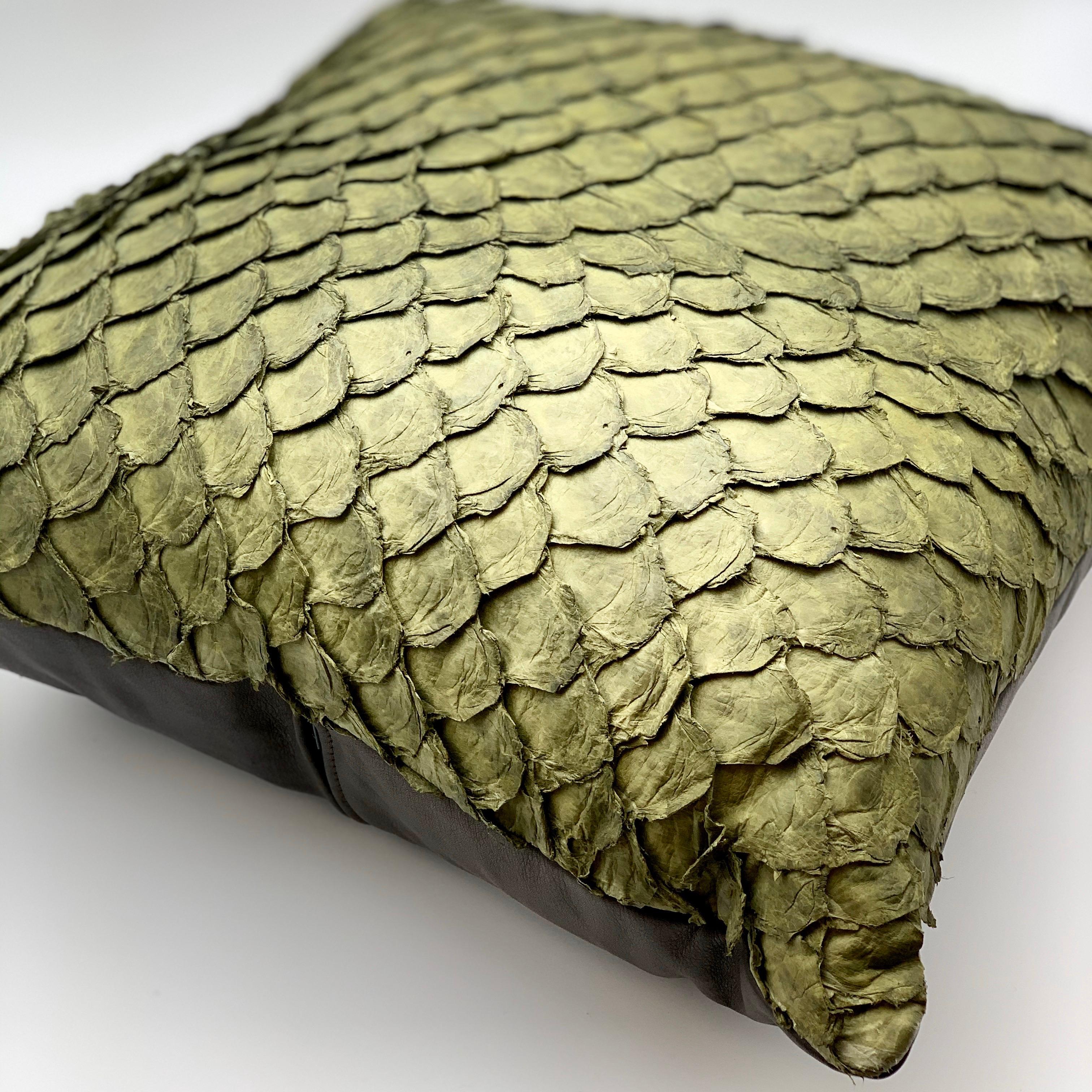 The Pirarucu fish leather cushion. Pirarucu fish comes from Brazilian food industry, it is the second largest river fish in the world after the beluga. Vegetable taning and dyed with anilines. Down feather insert. 

Sizes variable and made to