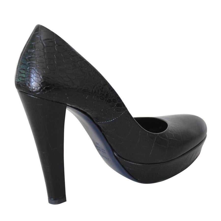 Leather Black color Heel height cm 14 (5.51 inches) Plateau height cm 3 (1.18 inches)
