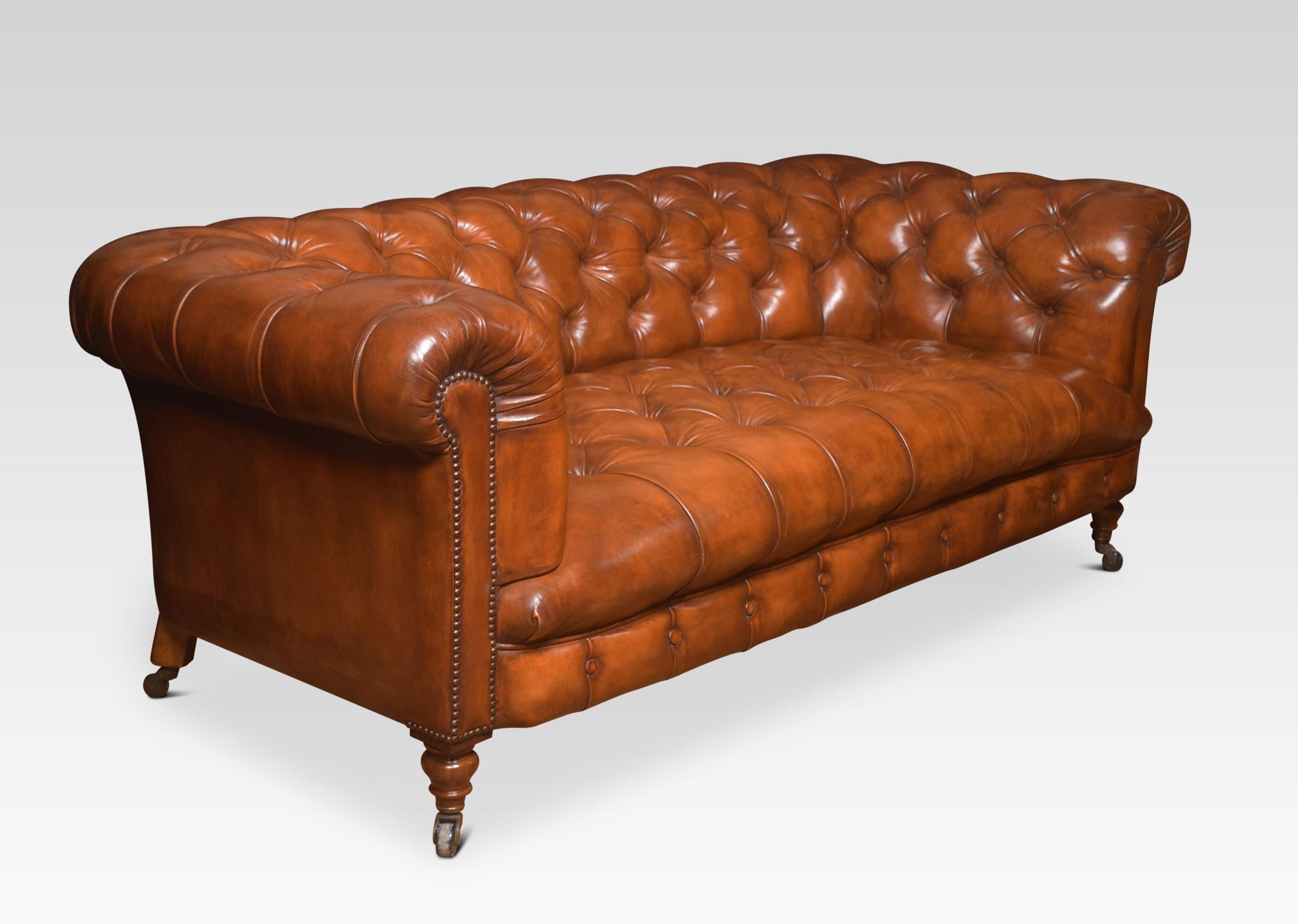 Large brown leather Chesterfield sofa, having deep buttoned back and seat, raised up on turned feet with brass ceramic castors. Good solid condition, the leather has been replaced and hand-dyed.
Dimensions:
Height 29 inches height to seat 18