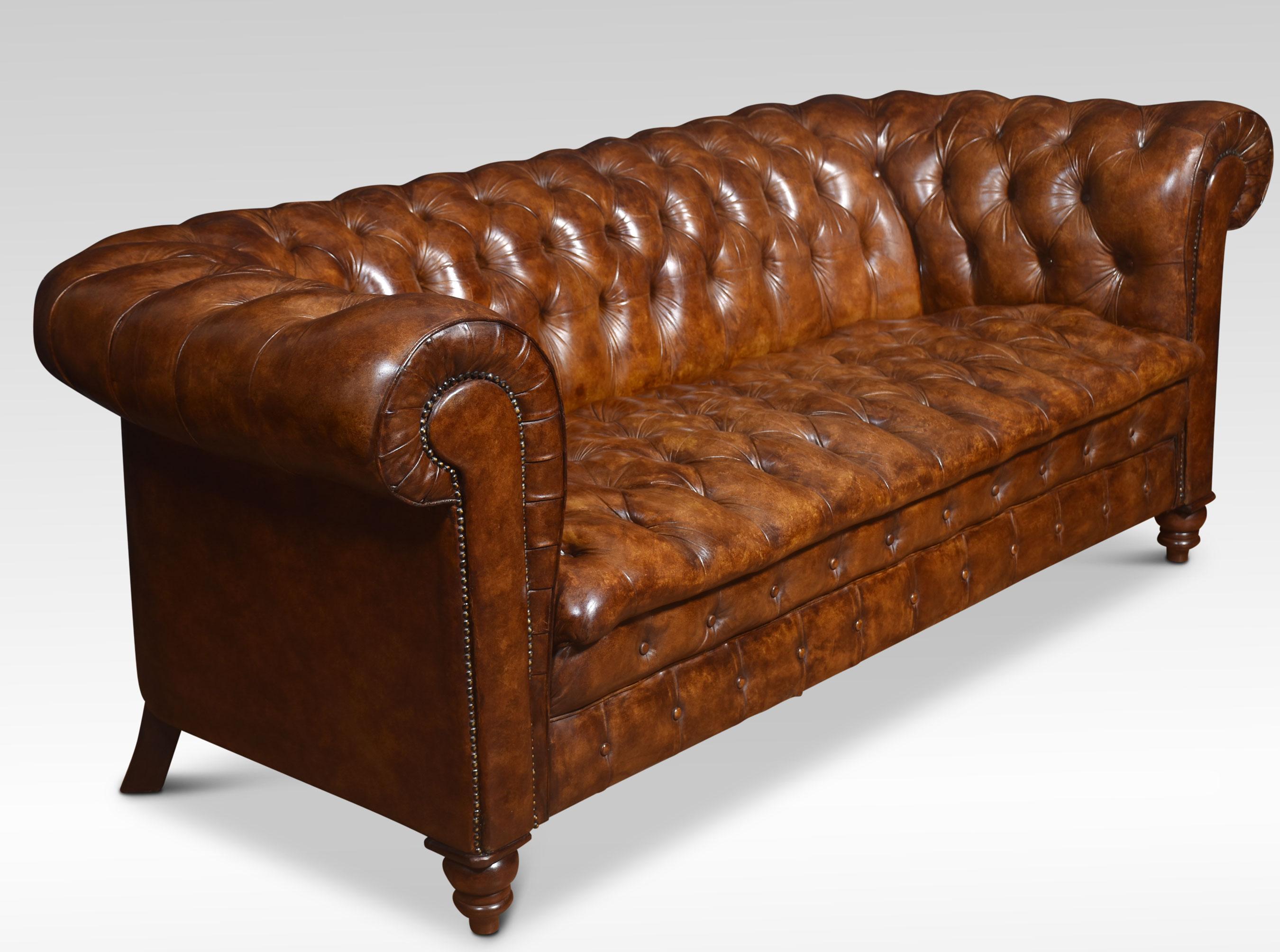 Large brown leather Chesterfield sofa, having deep buttoned back and seat, All raised up on turned feet. Good solid condition, and the leather is soft, and nicely worn in.
Dimensions
Height 31 Inches height to seat 18 Inches
Width 79 Inches
Depth 36