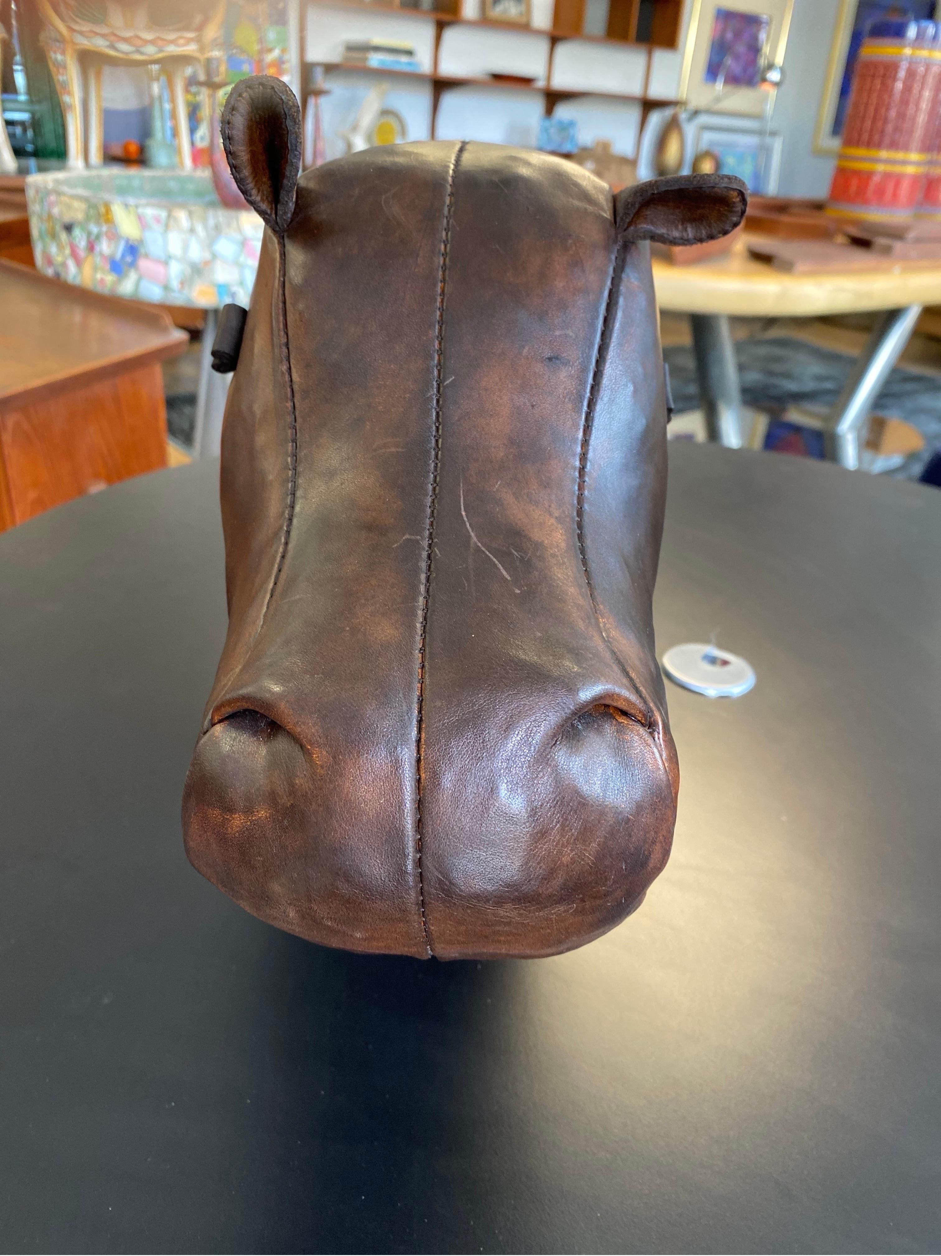 Adorable handstitched leather hippo footstool by Omersa, circa late 1990s. Omersa's animals can be used as a footstool/ottoman or as a unique statement piece. This leather hippo is in great condition.