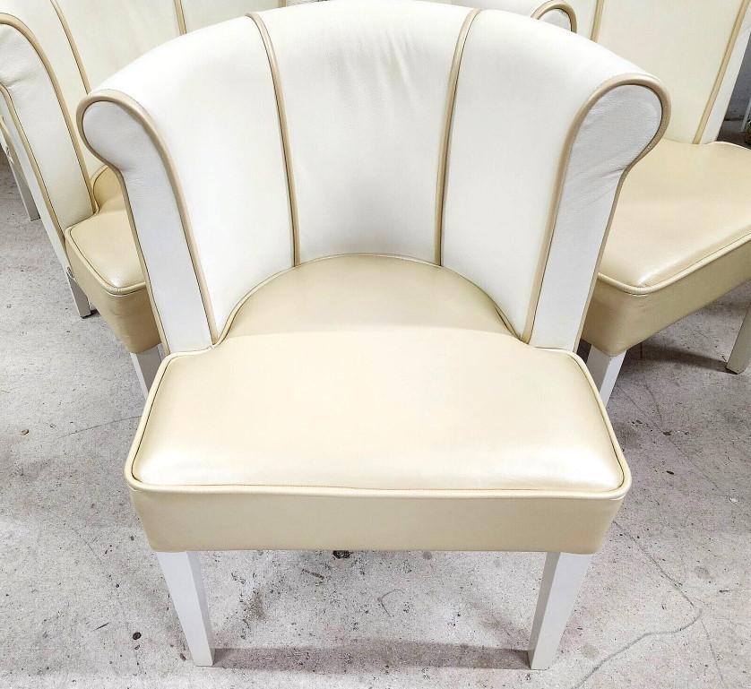 For FULL item description click on CONTINUE READING at the bottom of this page.

Offering One Of Our Recent Palm Beach Estate Fine Furniture Acquisitions Of A
Set of 8 Real Leather Barrel Back Dining Chairs by KANIA 
With lacquered white