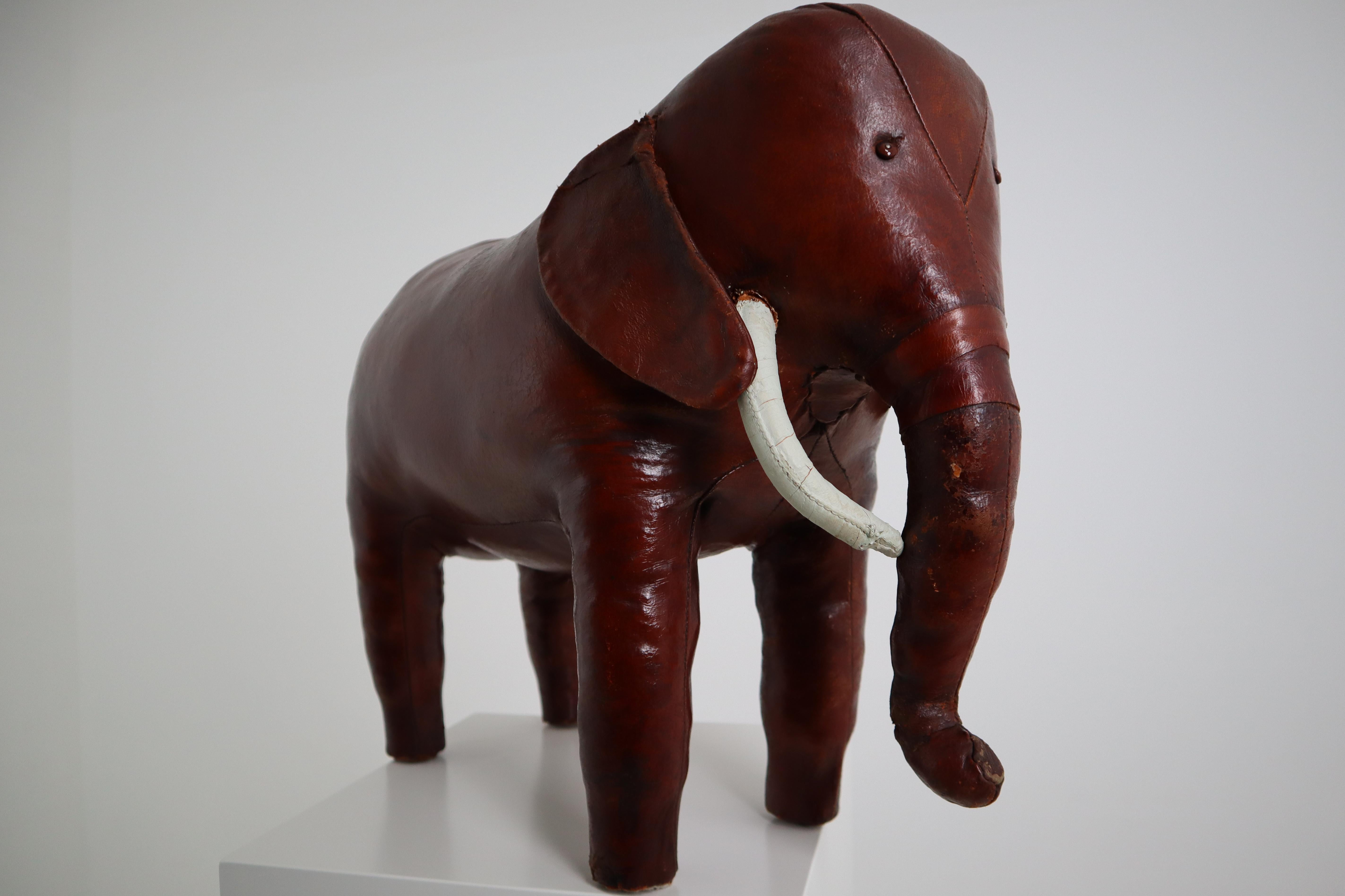 Fabulous vintage leather elephant foot stool by Dimitri Omersa for Abercrombie and Fitch. Incredible patina and good vintage condition, United Kingdom, 1960s.