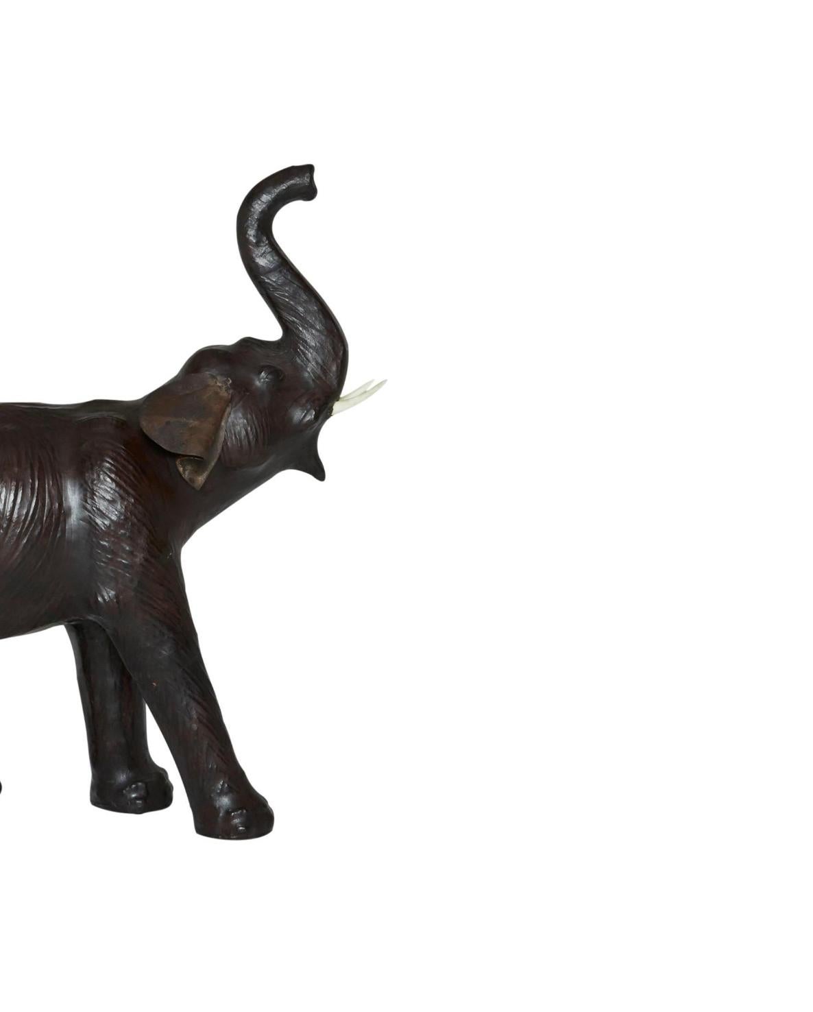 This leather elephant statue adds an eclectic accent to any vignette. A great addition to decor of African or Asian influences, as well as modern, Bohemian, and Industrial spaces. Animal art and decor is timeless, an endlessly relevant style.