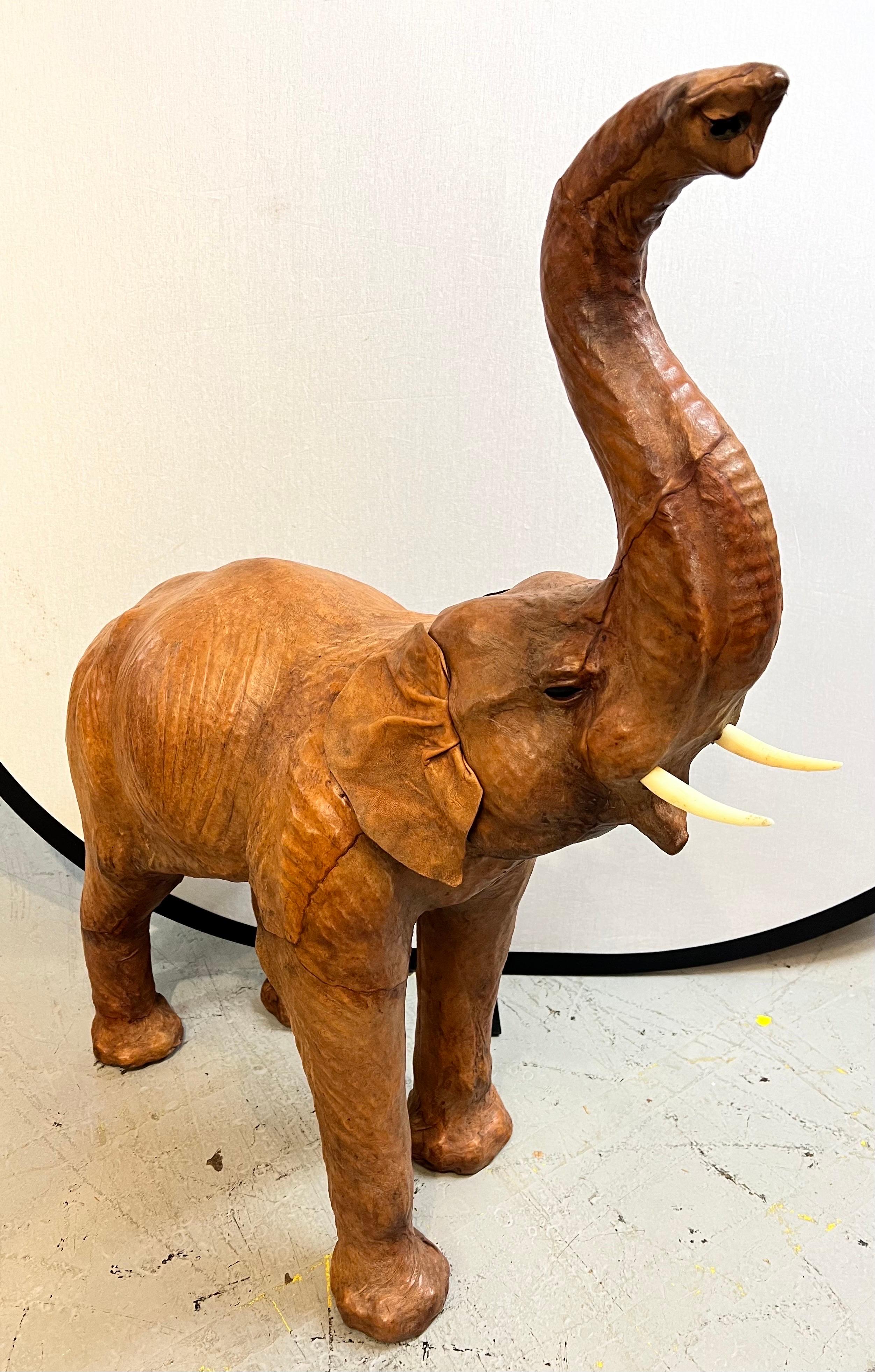 Stunning and unusual, due to its scale, is this leather elephant sculpture. The craftsmanship is impeccable and it stands 38
