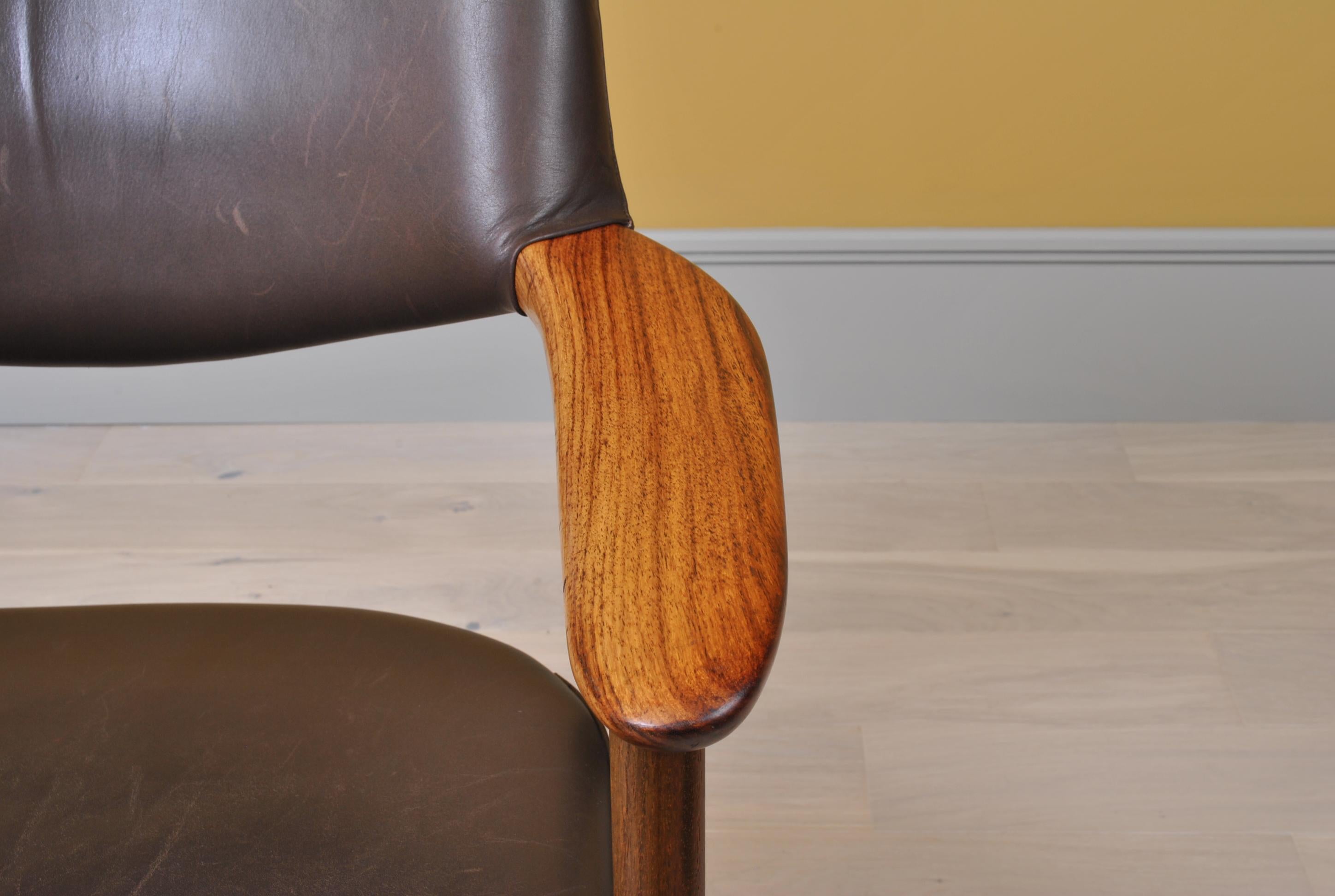 The Erik Kirkegaard desk chair is possibly the most comfortable chair of its kind that we’ve encountered over the years. The curves and angles hold and support the body extremely well. The chairs have walnut frames and dark brown leather upholstery.