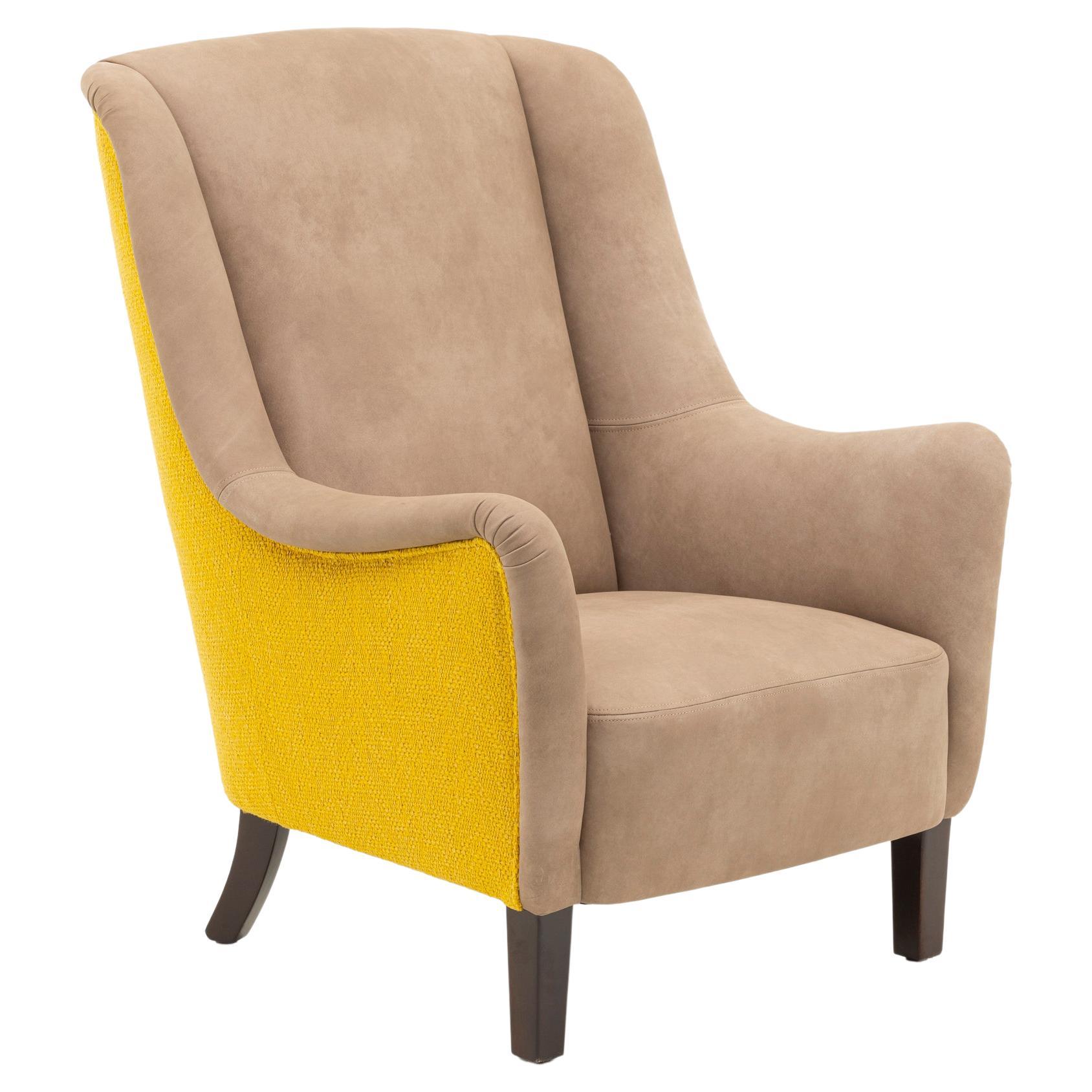 Fauteuil en cuir et tissu en vente