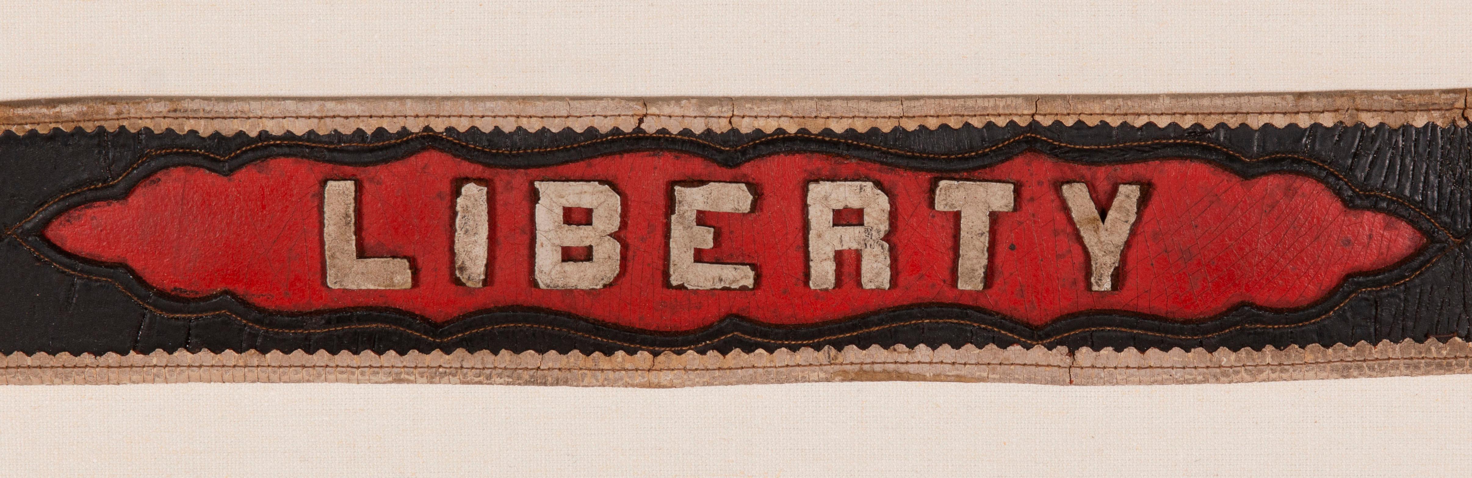 Leather fireman's parade belt with the word 