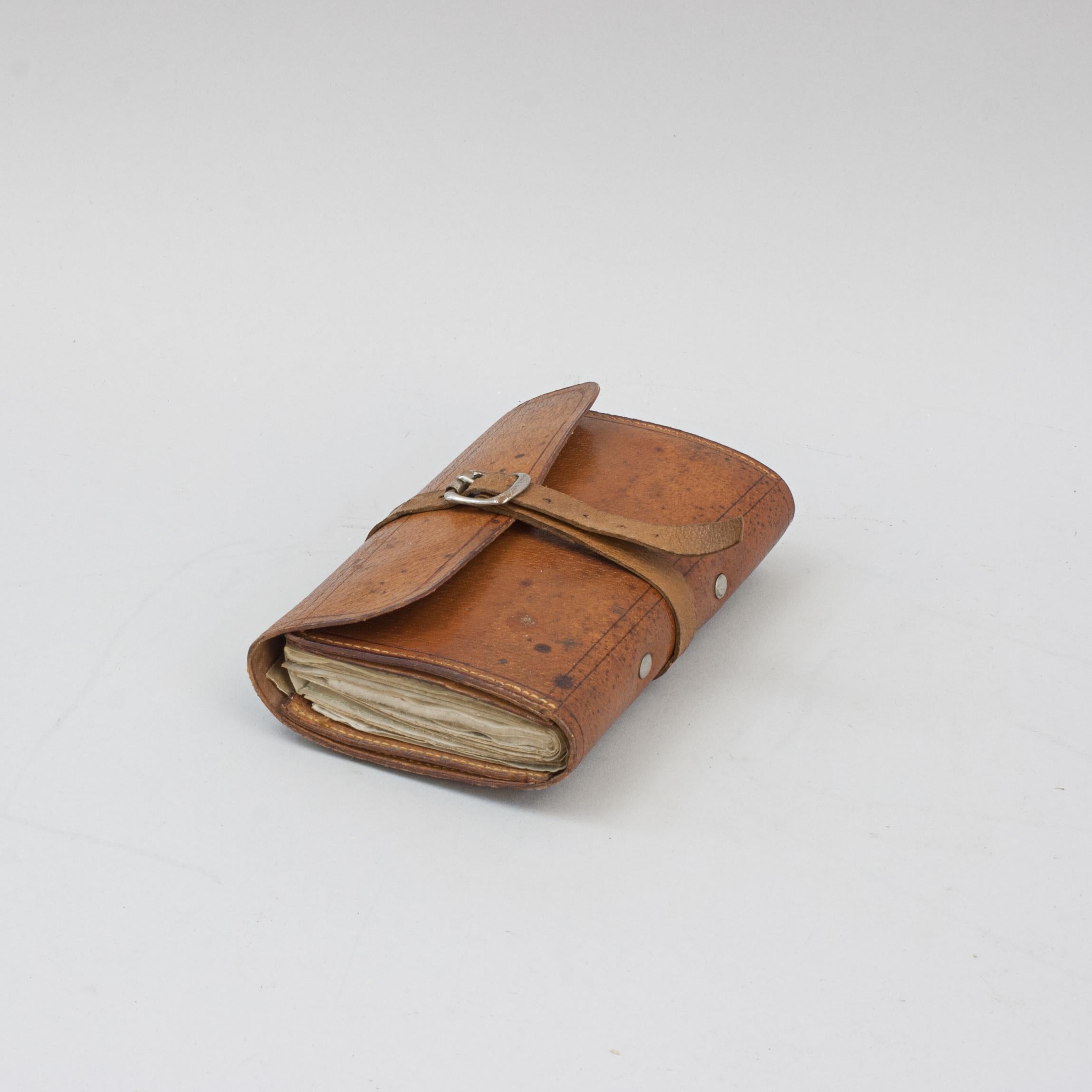 Vintage Leather Fly Wallet.
A good pigskin leather fishing fly and cast wallet with embossed tram line decoration. The brown leather is in original condition, the strap and buckle is a replacement. The wallet has two inside pockets, a selection of