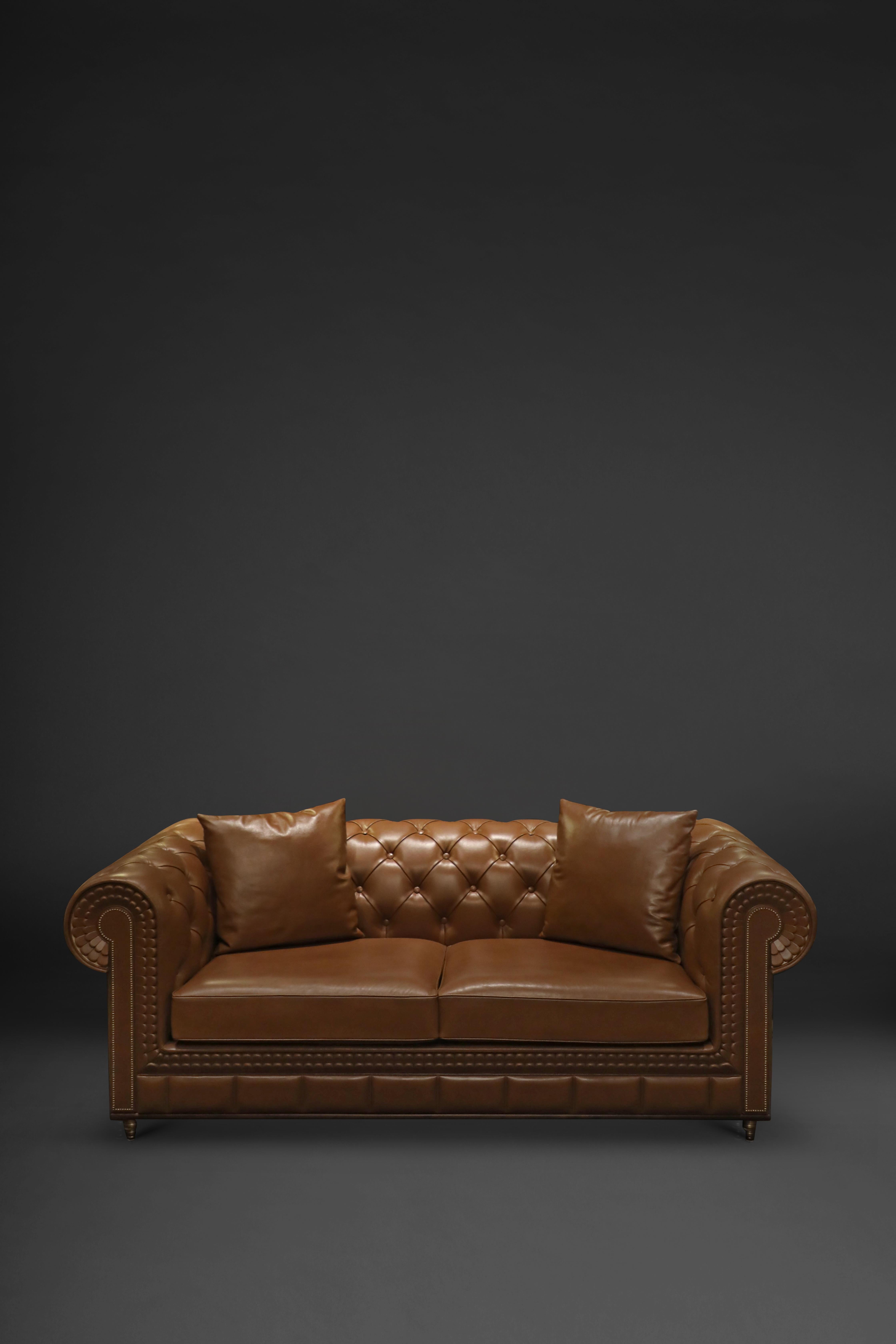 Leather Fitz study sofa by Madheke.
Dimensions: W 189 x D 90 x H 70 cm.
Materials: Leather, wood, metal.

Chesterfield inspired study sofa with layered leather front and arm detailing.

Reflecting the finest in craftsmanship, innovation and