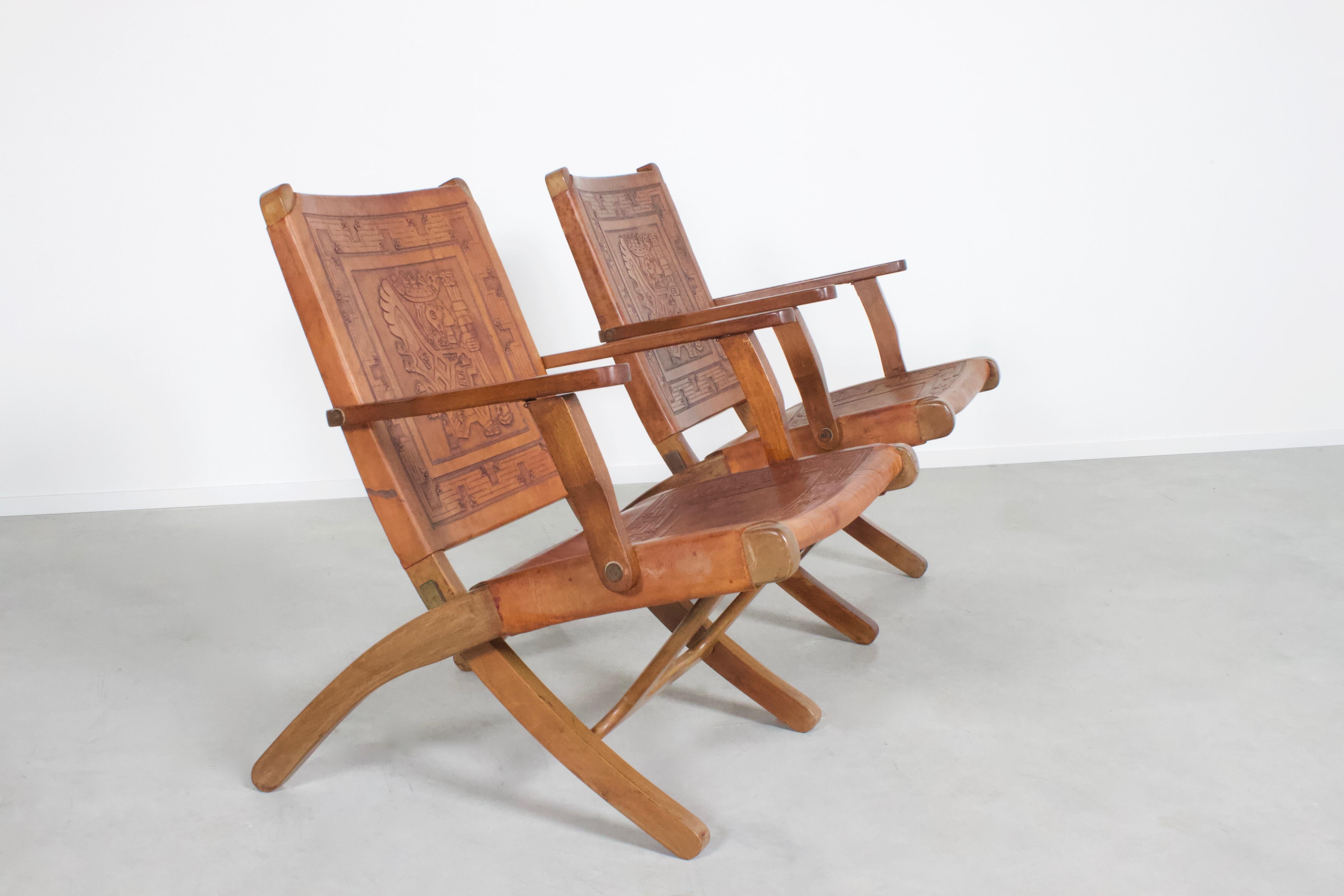 Angel Pazmino folding chairs in good condition.

Manufactured by Muebles de Estilo, Equador

The chairs have a solid Meranti frame and the backrest and seat are made of thick brown saddle leather.

De leather is embossed with Inca patterns and