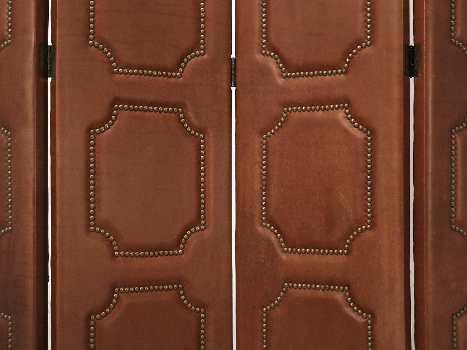 Leather Four-Panel Folding Screen or Room Divider with Bronze Nails Very Heavy In Good Condition For Sale In Chicago, IL
