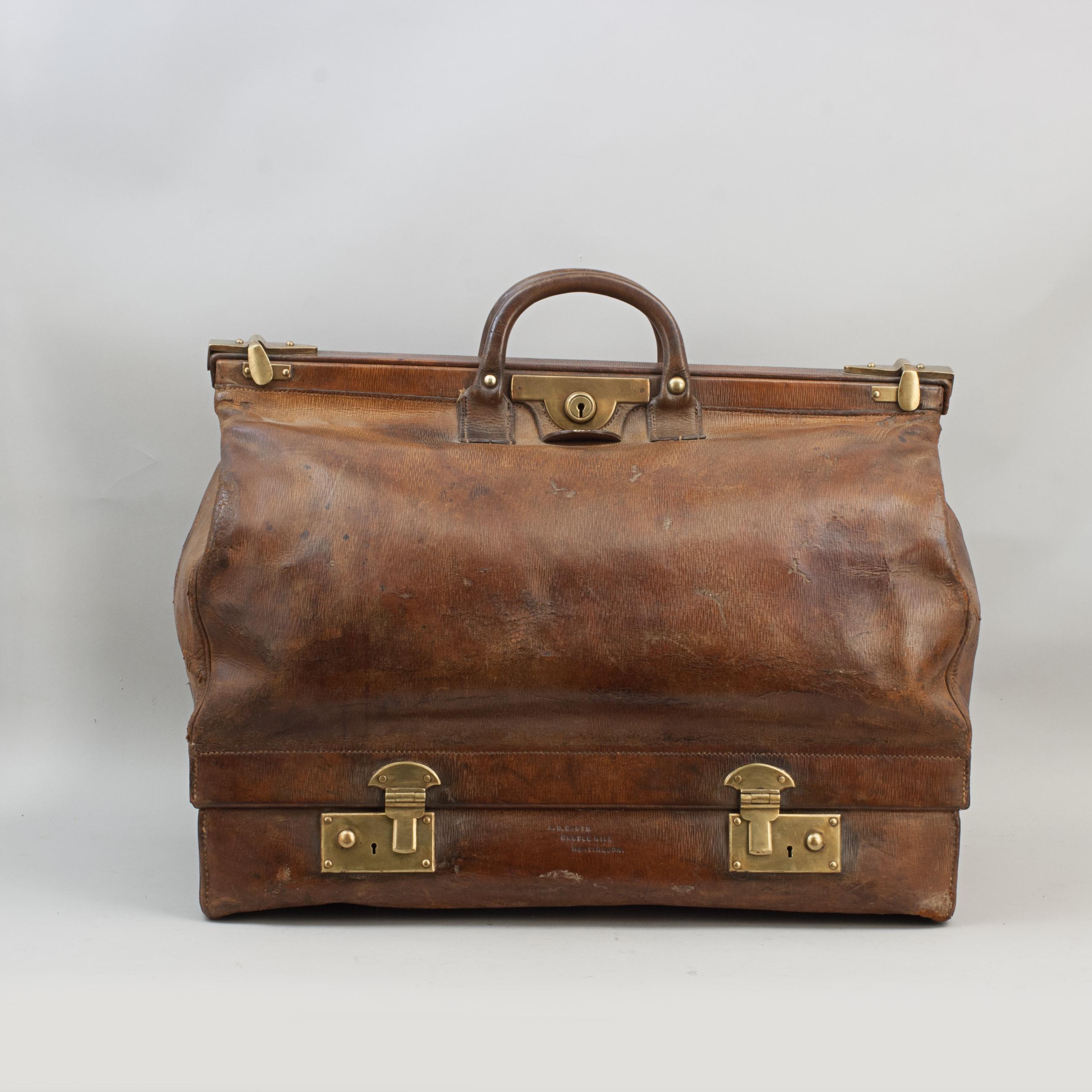 Unusual Antique Leather Gladstone Bag.
A fantastic leather Gladstone bag of unusual design with a separate suitcase compartment. The vintage holdall is stamped 'Hill Maker Newmarket' on the edge of the bag and 'H.W. Hill Newmarket' on the leather