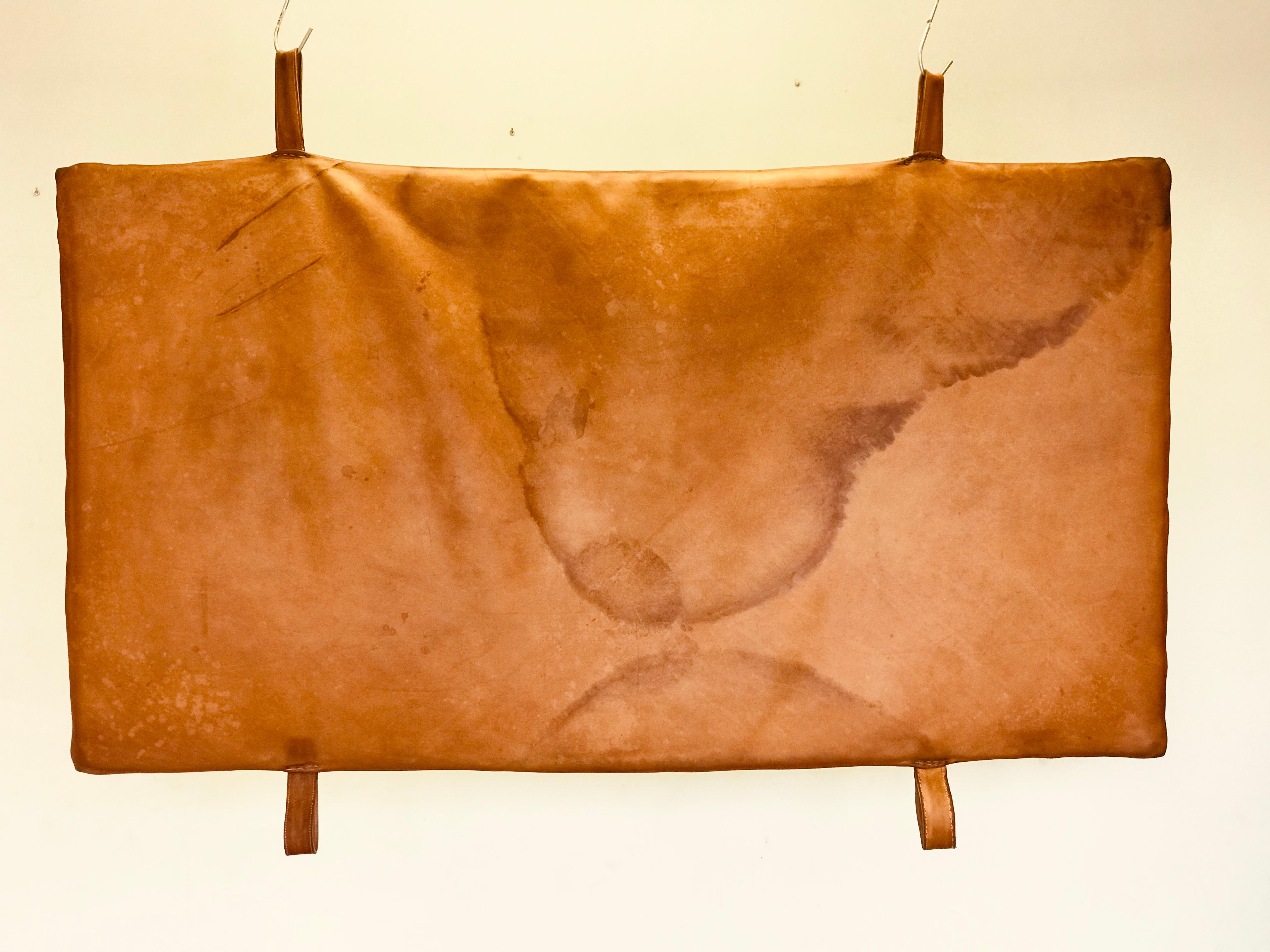 The mat has thick leather in original patina in a very good condition. Possibility to buy 4 pieces in the same condition.