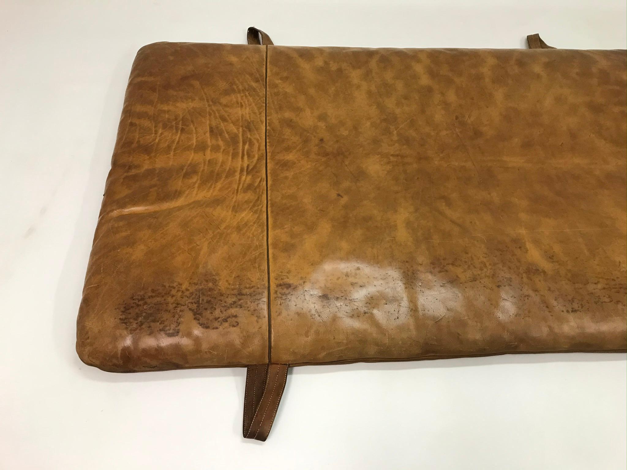 The mat has thick leather in original patina in a very good condition.