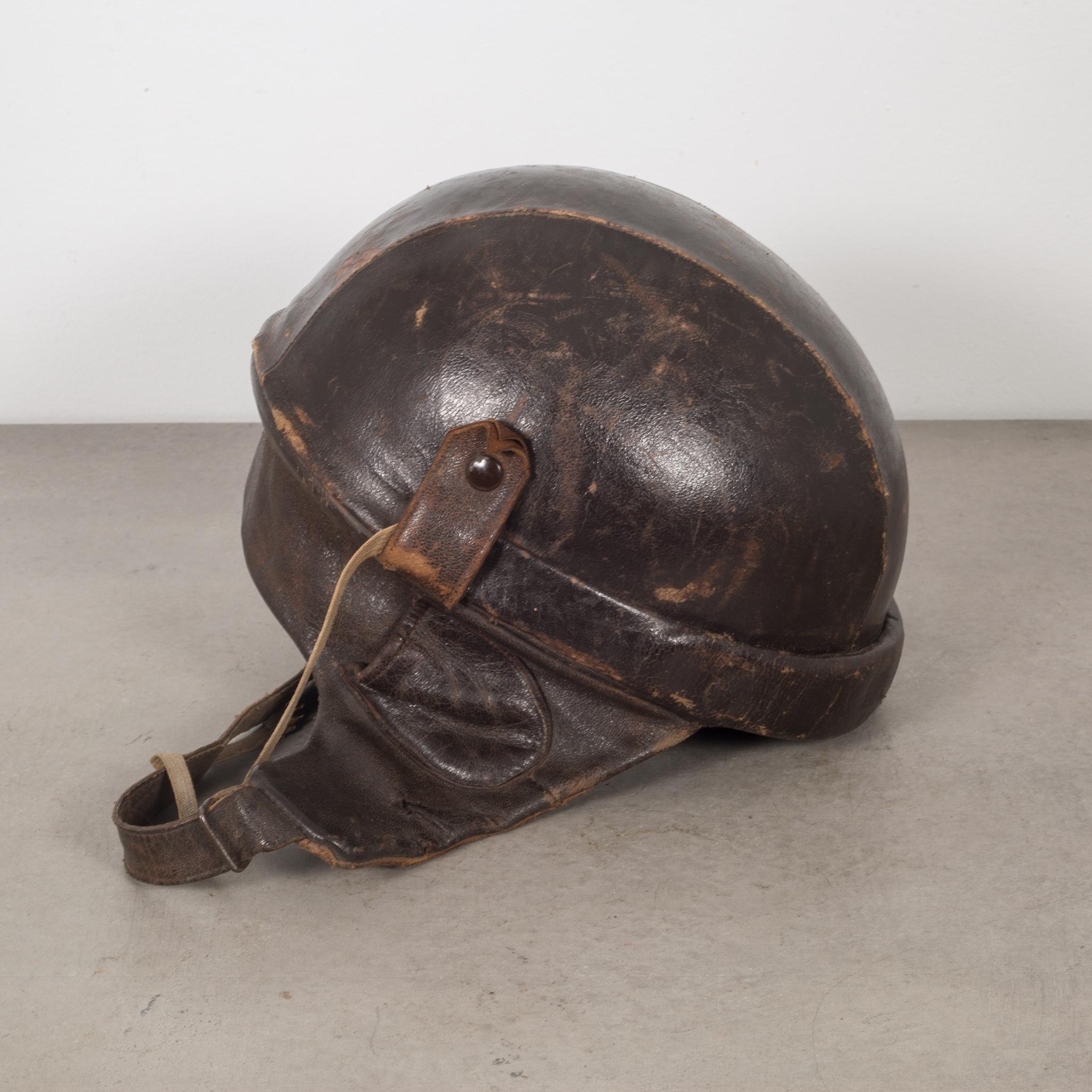 About

This is an all leather half bowl motorcycle helmet with wrap around chin strap and neck cover. There are two snaps on each side. This piece has retained its original finish.

Creator Unknown.
Date of manufacture circa 1940.
Materials