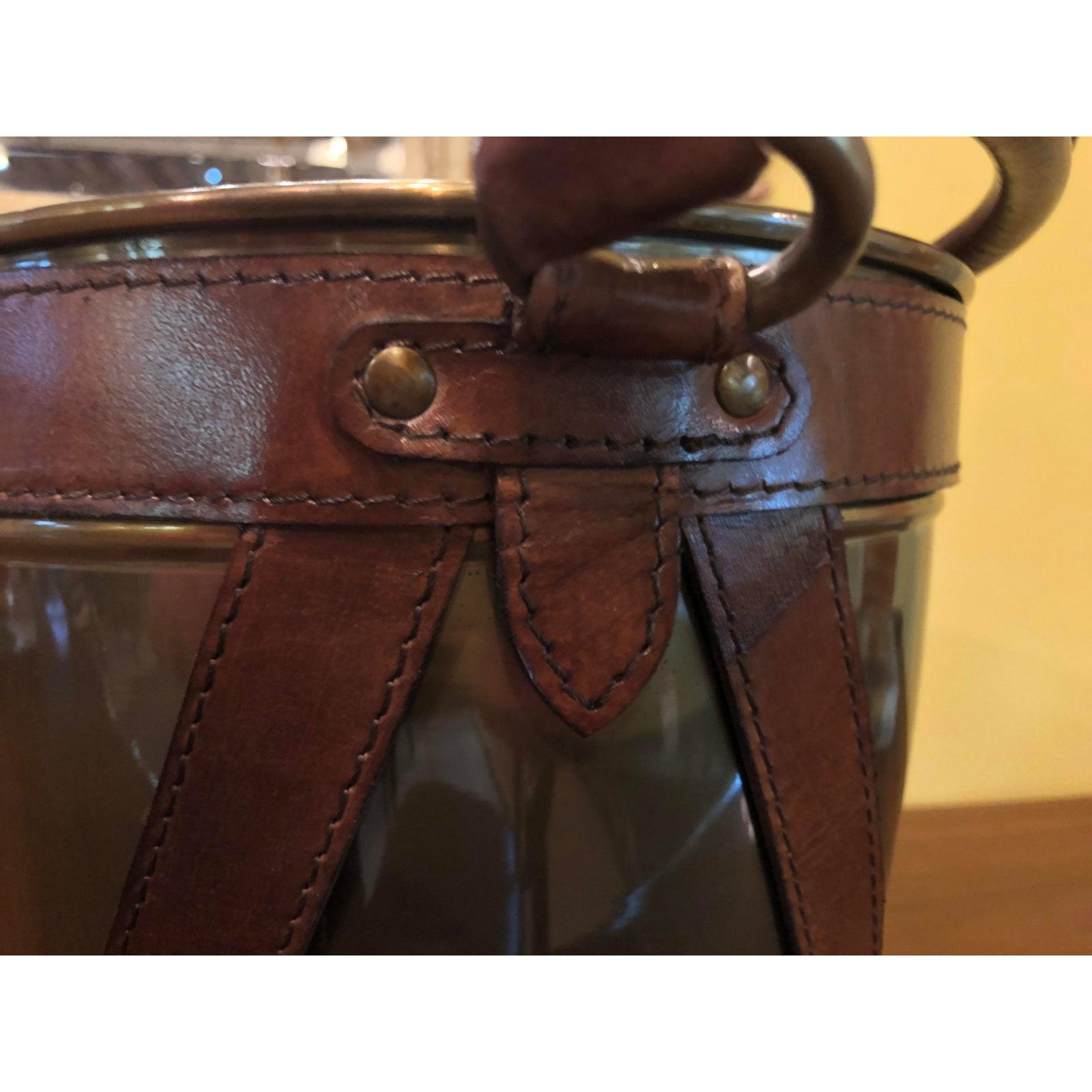 Leather handle midcentury style champagne ice bucket
Handsome Midcentury style modern ice bucket decorated with leather stripes and leather handle. An eye catching piece.