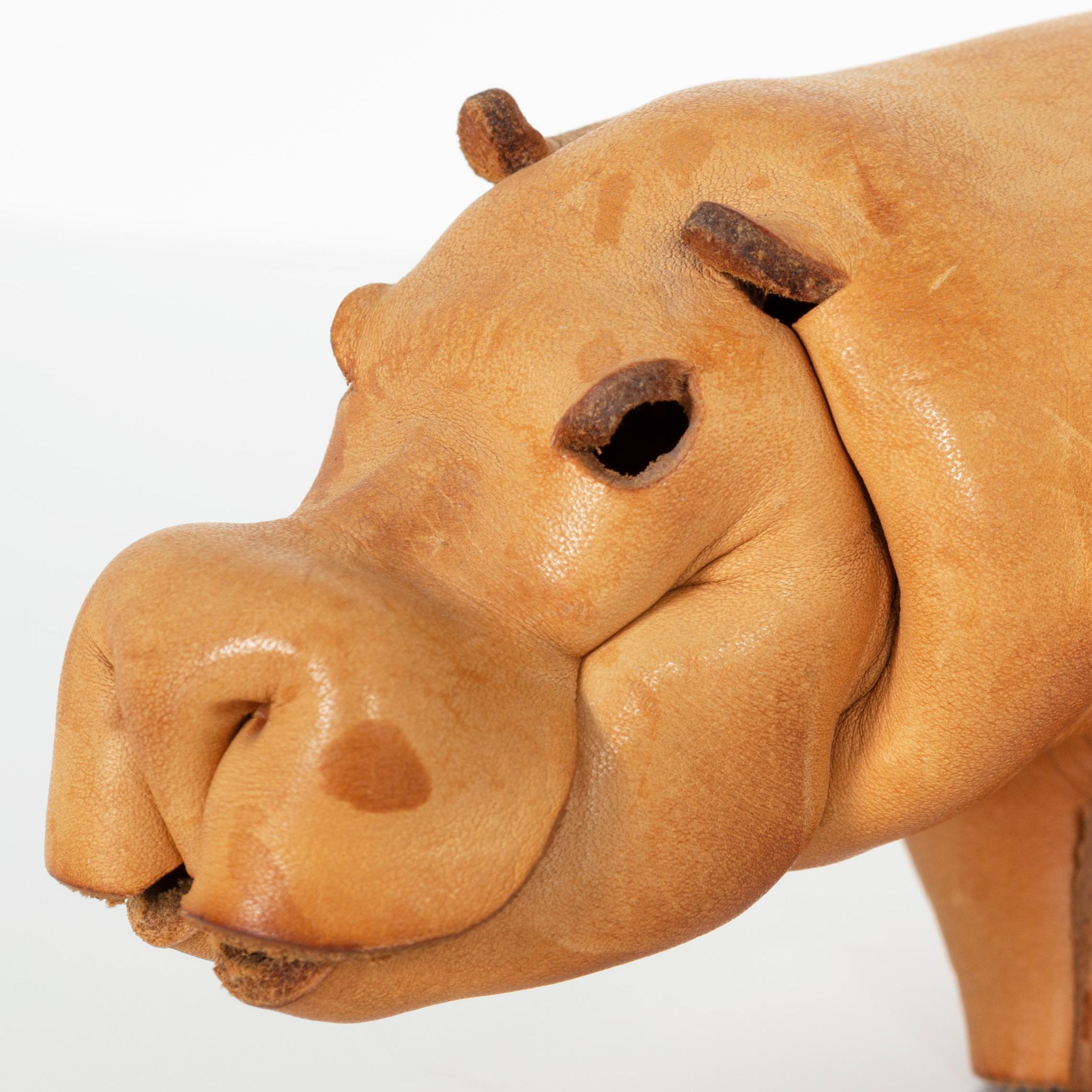 Leather Hippo by Deru,
A Hippo handcrafted from a pinched and riveted piece of leather.
Stamped Deru Germany.