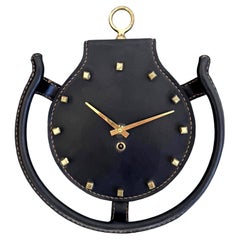 Horloge murale en fer à cheval en cuir par Jacques Adnet, 1950s France