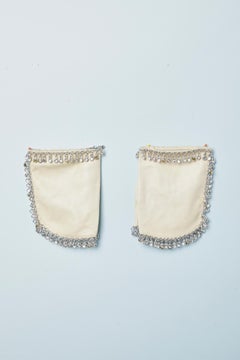 Manoplas de cuero color marfil con metal color plata y borde de strass  Swarovski