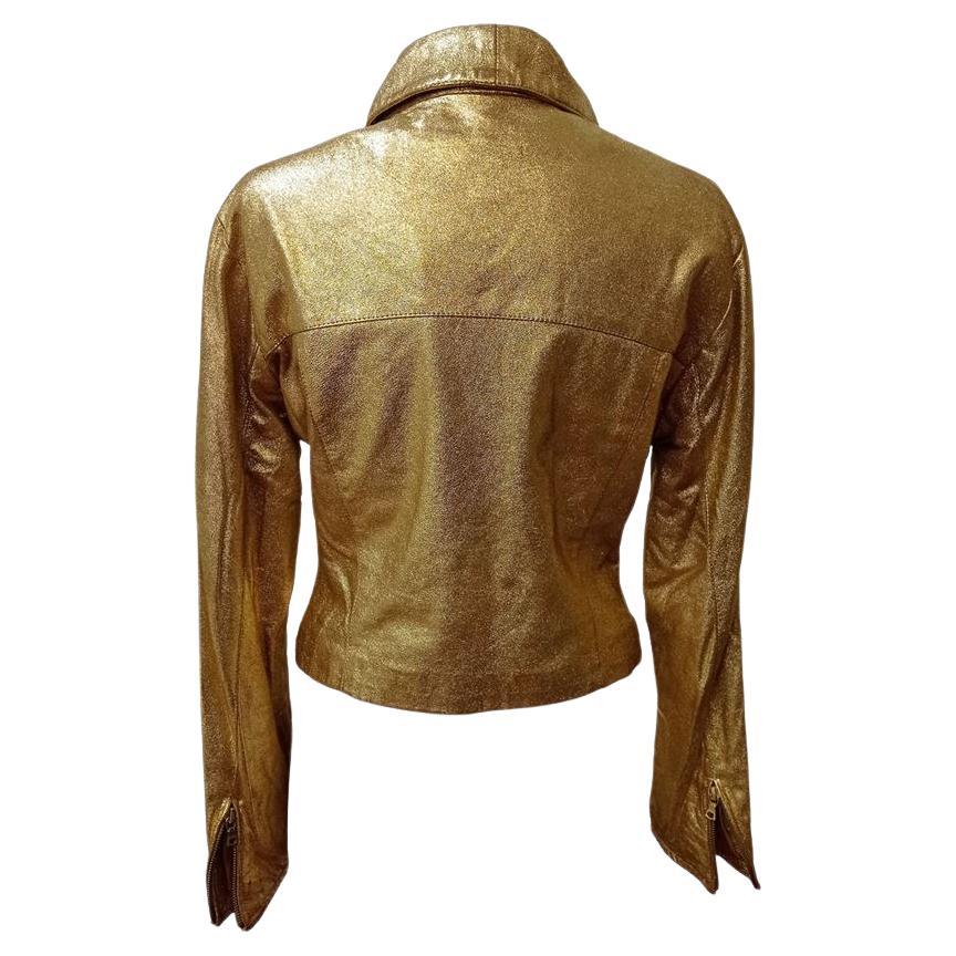 Leather Gold color Zip closure Two pockets Zip on sleeves Length from shoulder cm 48 (1889 inches) Shoulders cm 42 (1653 inches)
