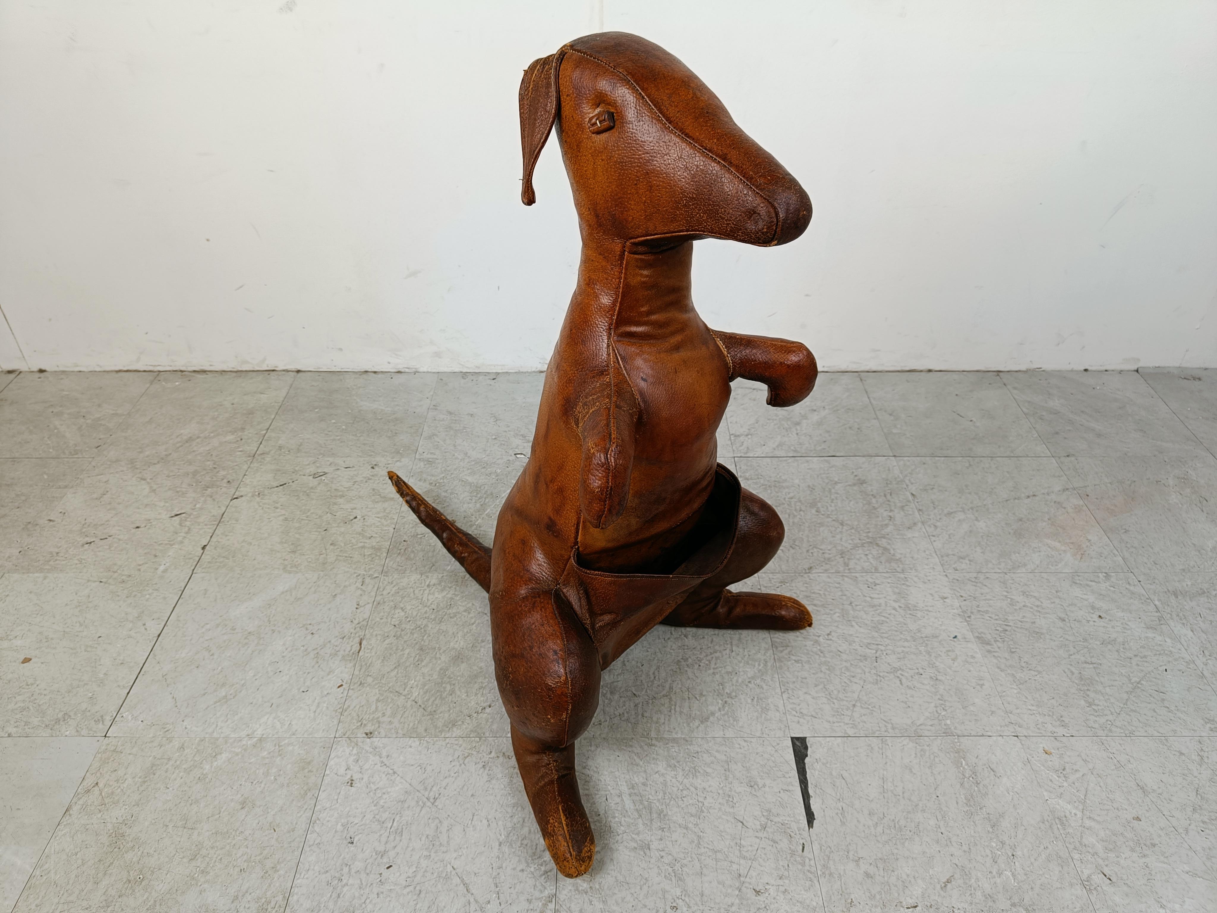 Very decorative leather magazine holder Kangaroo designed by Dimitri Omersa for Abercrombie & Fitch.

Dimitri Omersa is known for mostly the rhino, pig, hippo, footstools, this is a more rare example of his work.

Made of top quality full grain