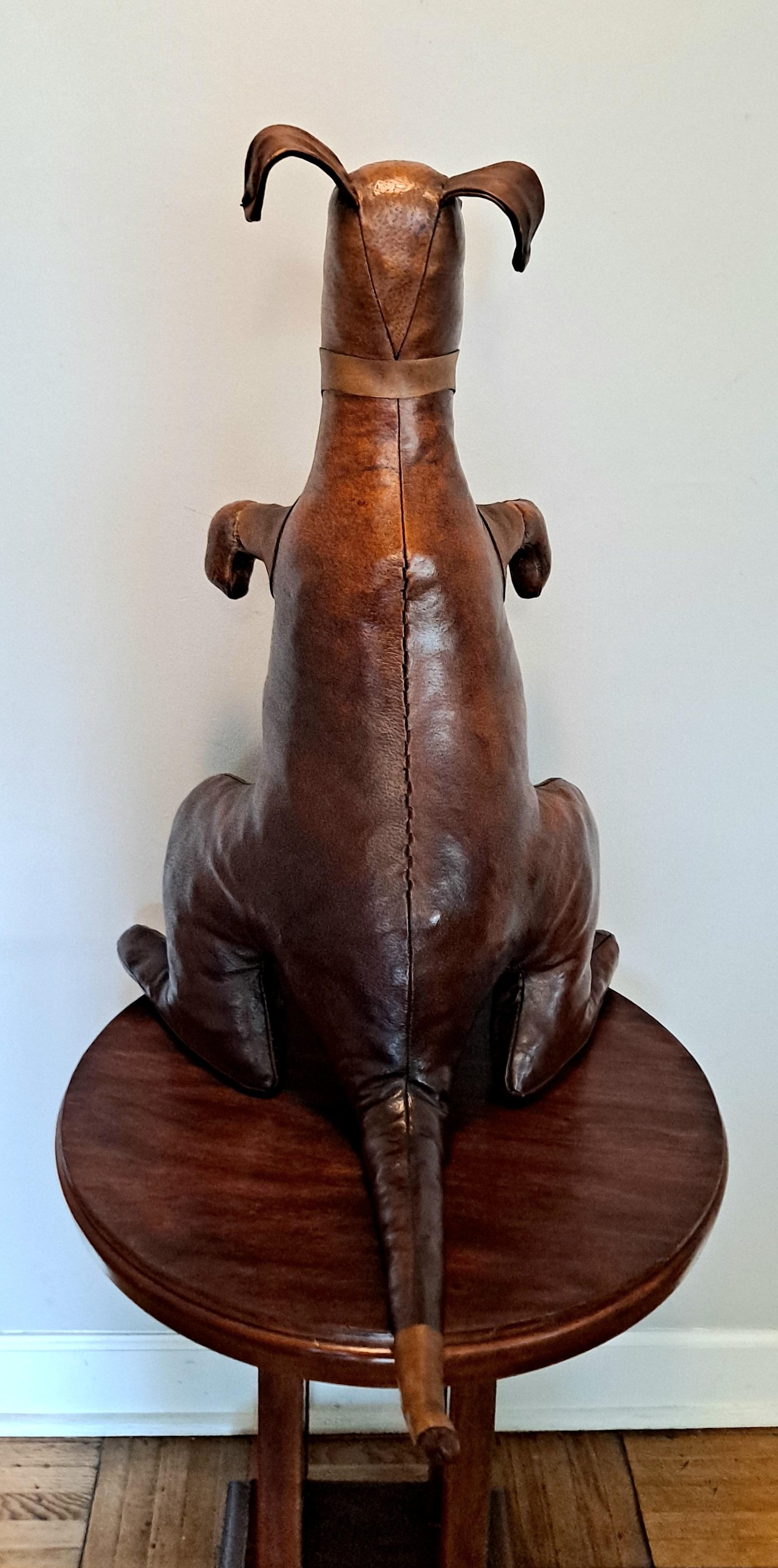 Mid-20th Century leather Kangaroo magazine Holder by Dimitri Omersa For Sale