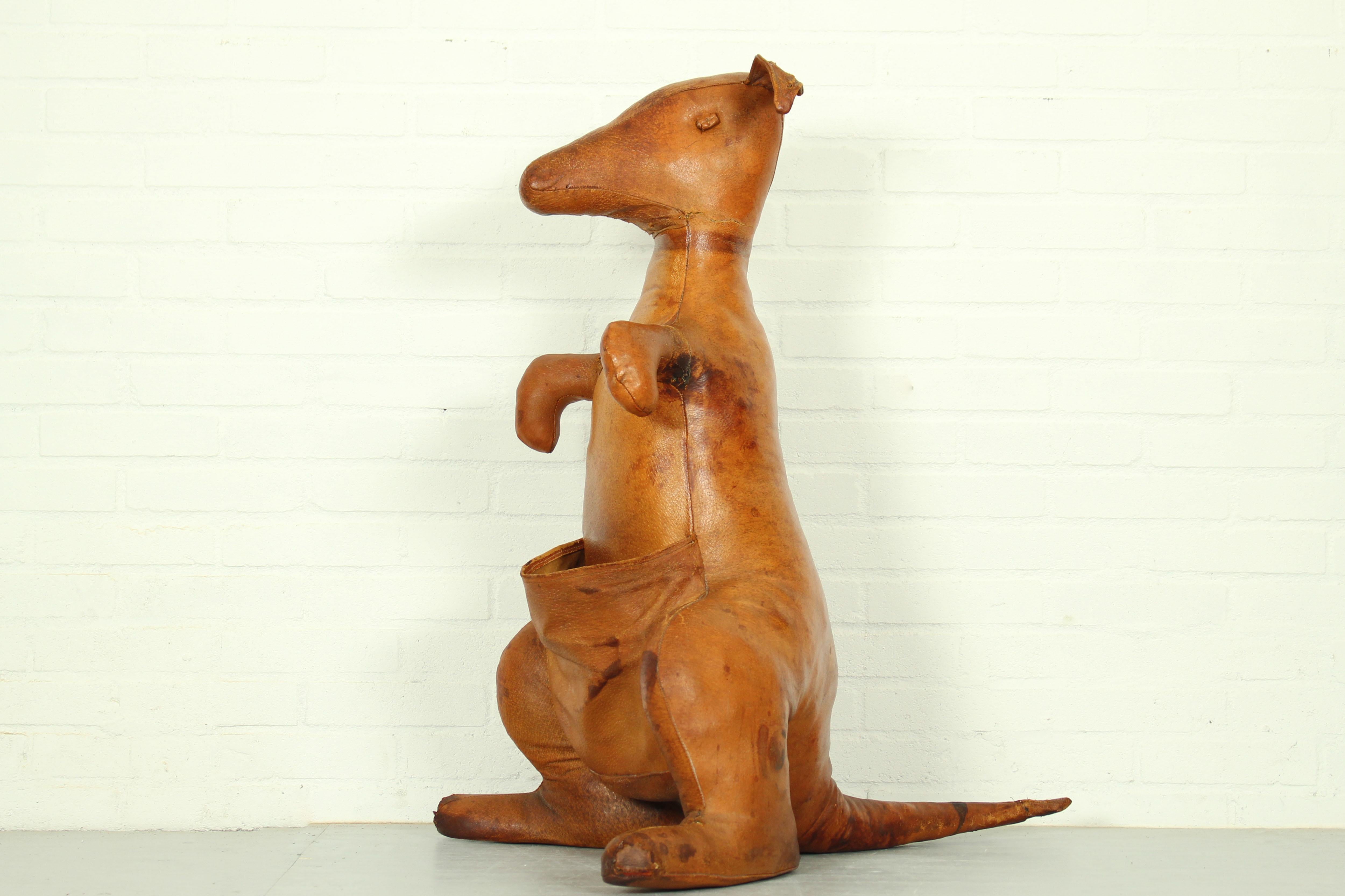 Decorative leather magazine holder Kangaroo designed by Dimitri Omersa, England 1960. The Kangaroo is one of the rarer and nicest animals produced by Dimitri Omersa for Liberty’s. This kangaroo was made of top quality full grain cowhide leather,