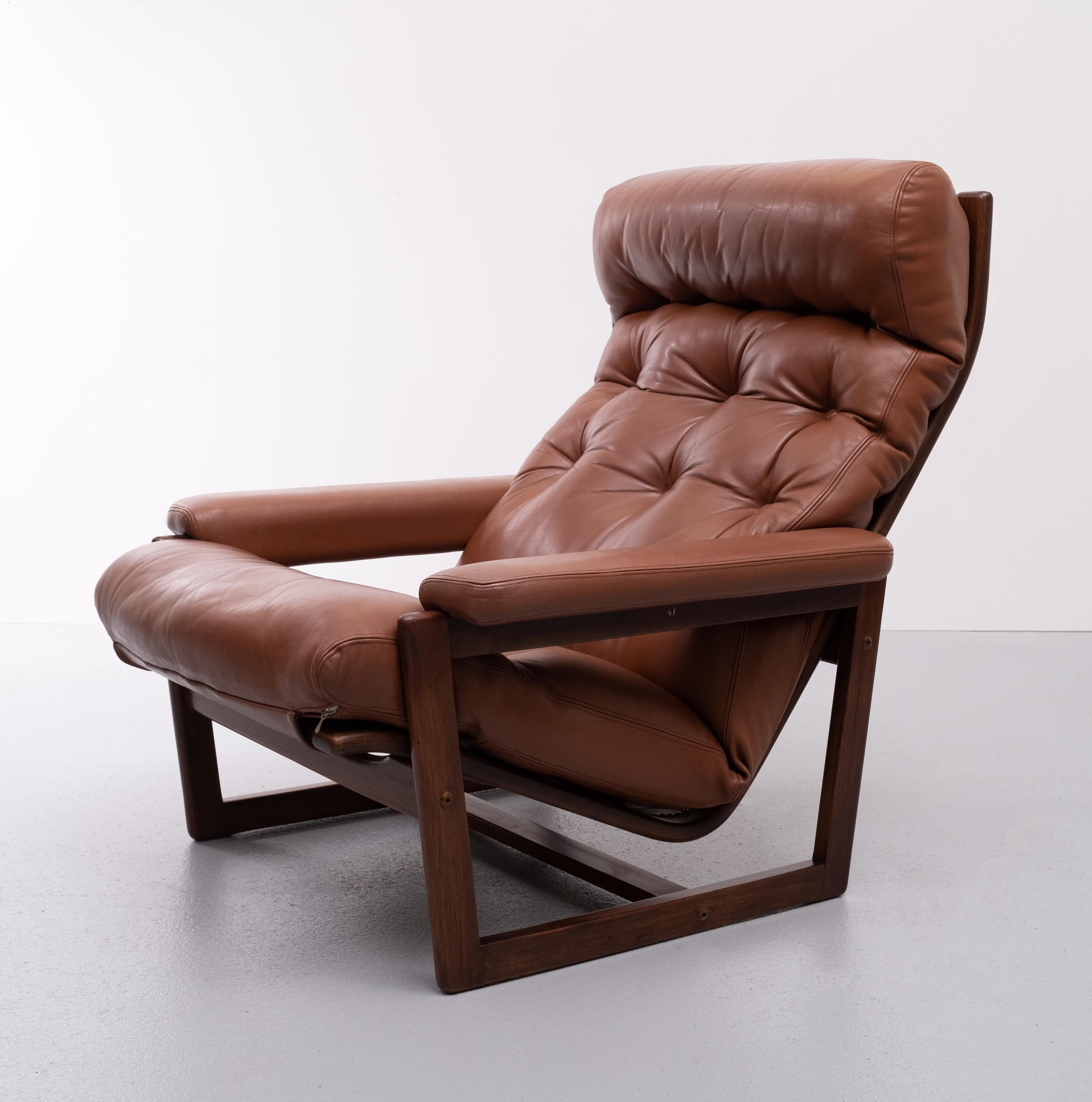 Danish Leather Lounge Chair and Ottoman, 1970s, Denmark