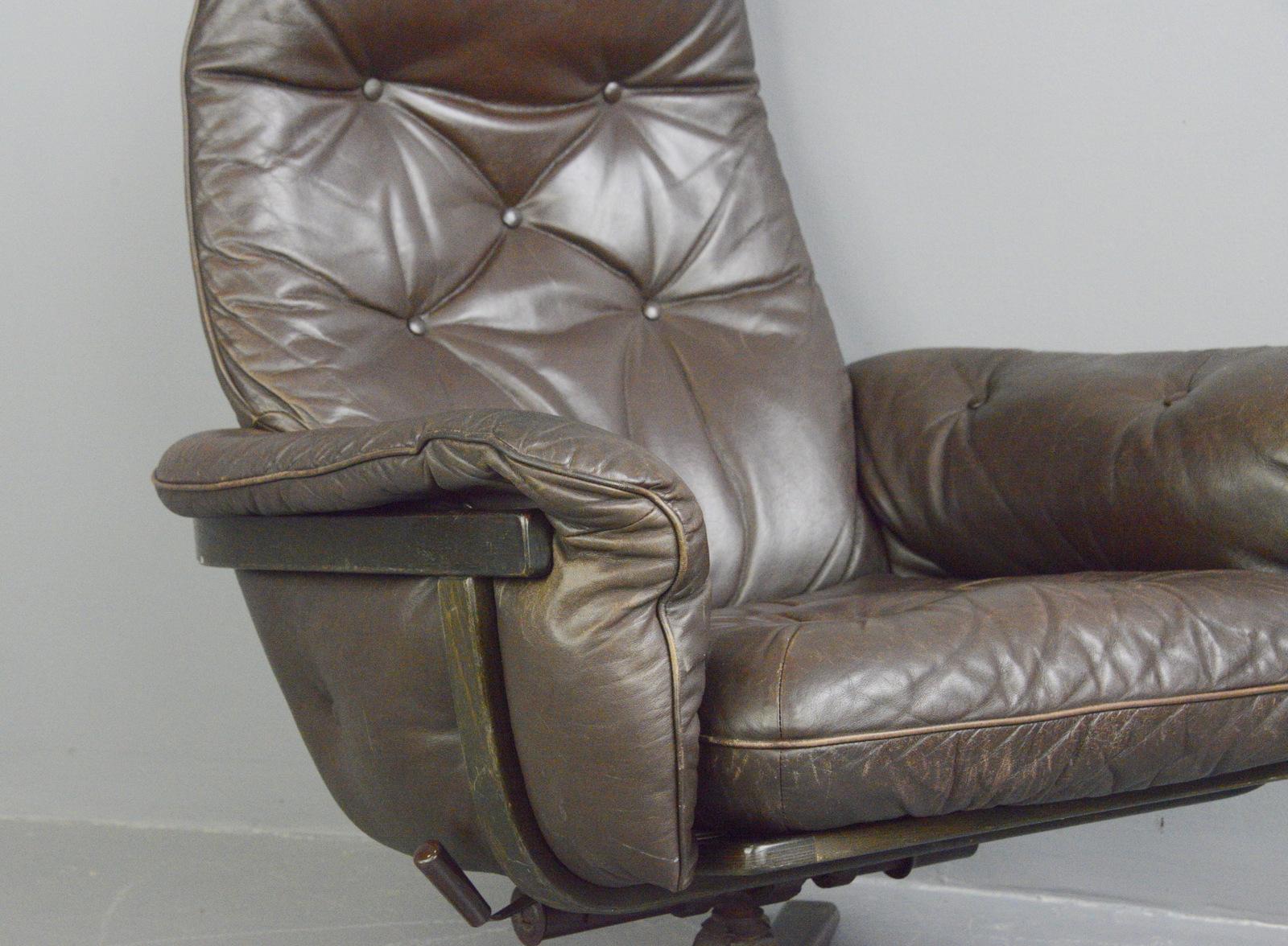 Leather lounge chair by G Mobel, circa 1960s

- Chocolate brown leather
- Button back
- Swivels and reclines
- Bentwood frame
- Produced by G Mobel
- Swedish ~ 1960s
- Measures: 85cm wide x 80cm deep x 102cm tall
- 44cm seat