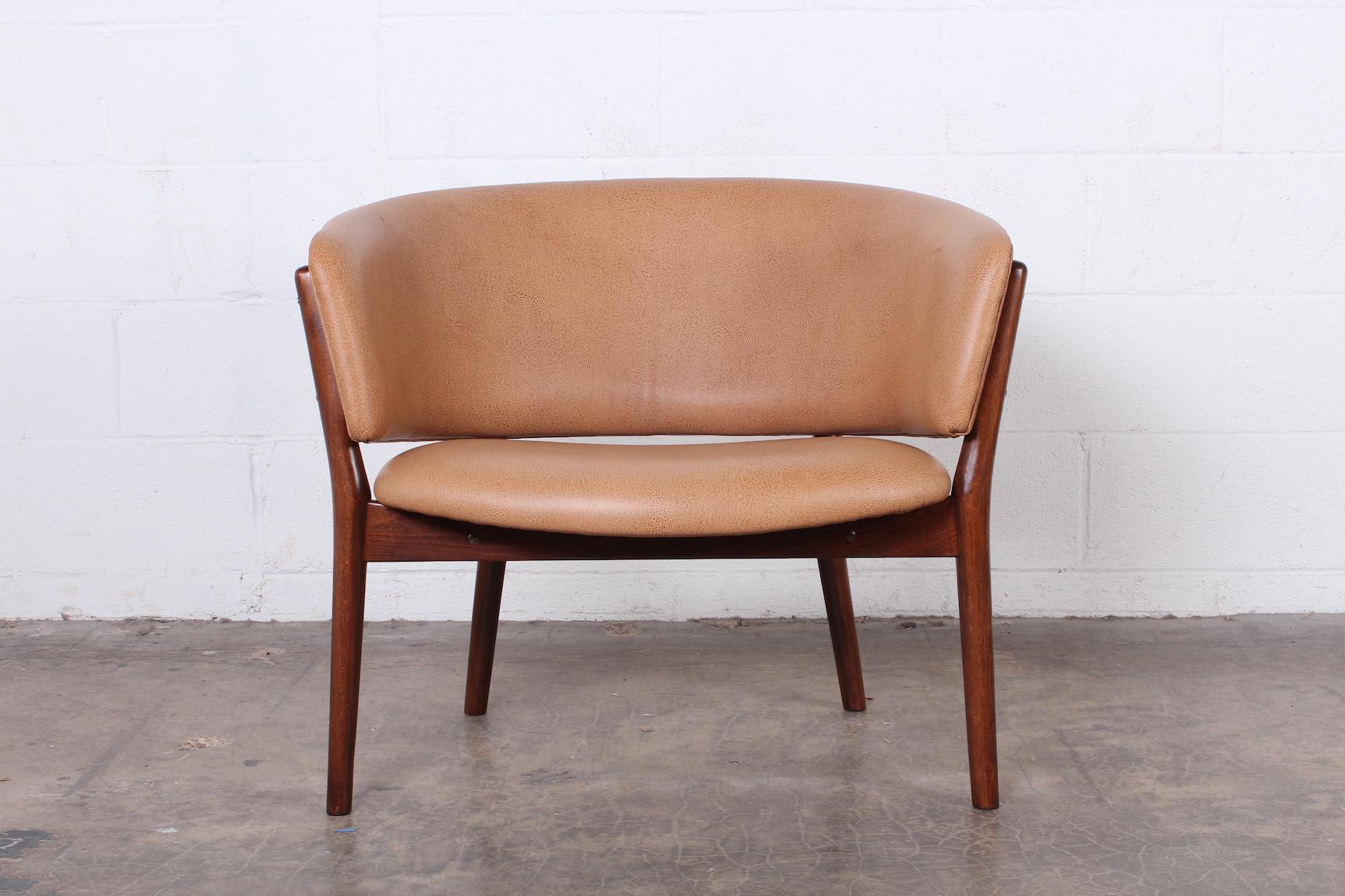Nanna Ditzel lounge chair in teak and leather.