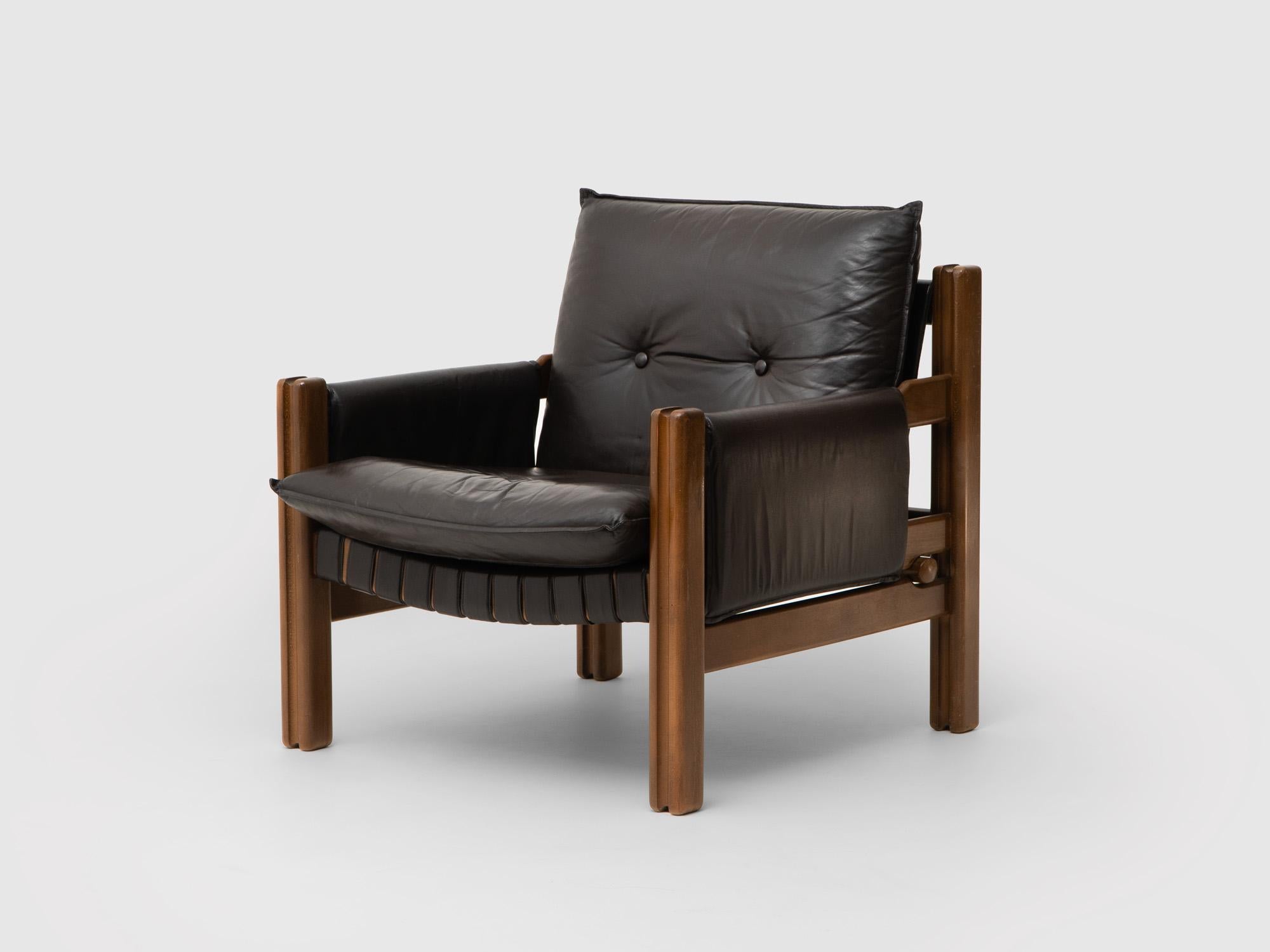 Leather and stained beechwood armchair by Ton, Czech Republic. Designer - Boris Hála. The couch was designed in 1984 as a part of series of luxury furniture in set called Eduard. The set was awarded with the best product of the year in 1984.