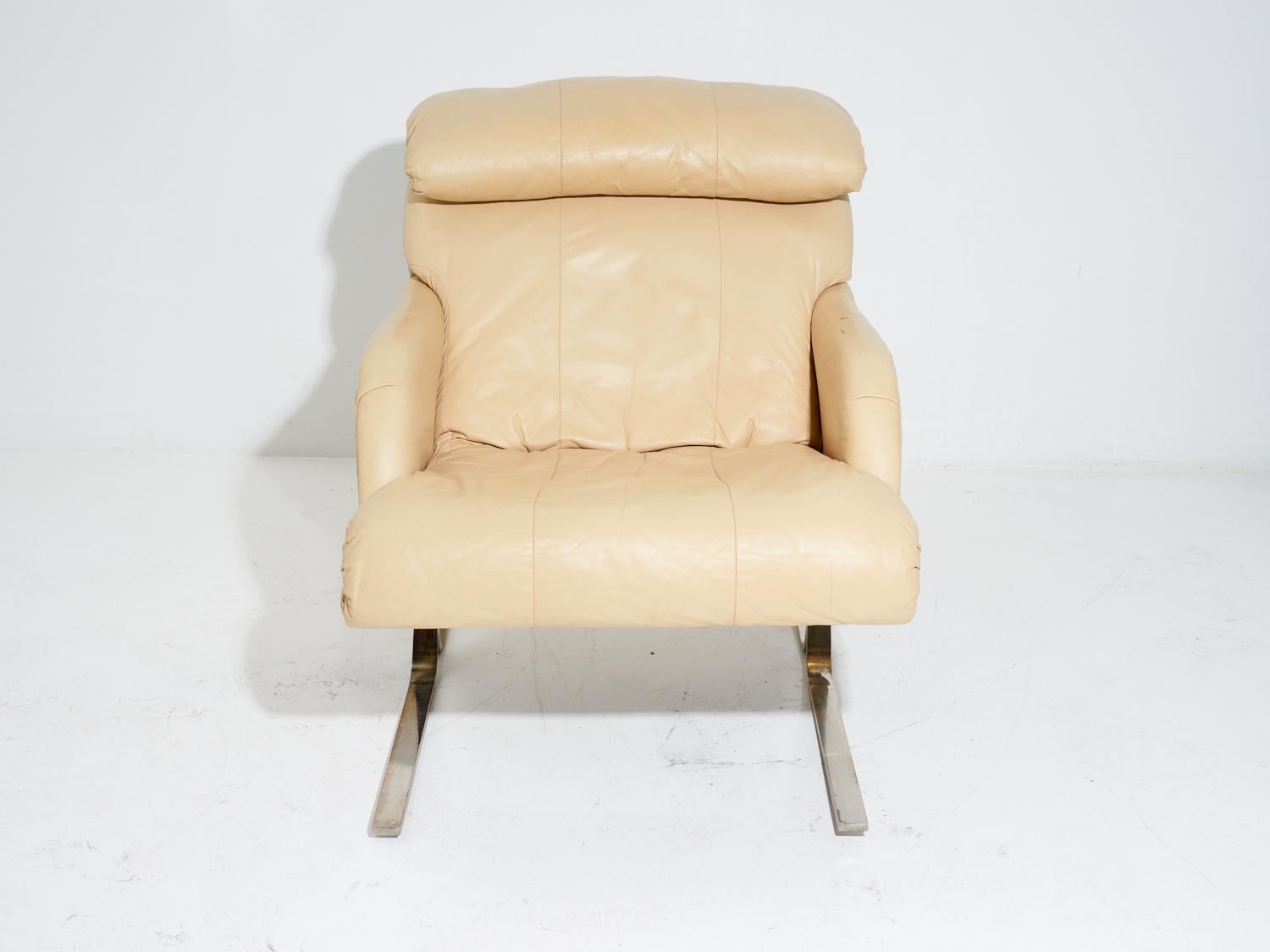 Say hello to the vintage tan leather lounge chair, a faithful companion for all your lounging needs. Whether you're taking a cat NAP, binging your favorite show, or simply soaking in the sun, this chair will be there to provide the support you