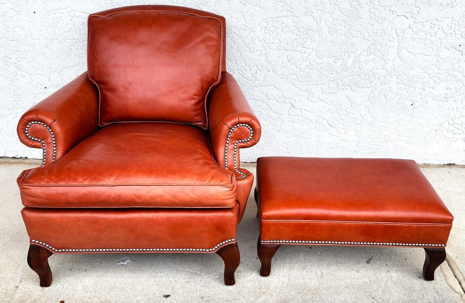 For FULL item description click on CONTINUE READING at the bottom of this page.

Offering One Of Our Recent Palm Beach Estate Fine Furniture Acquisitions Of A
Classic Highly Stylized Top Grain Leather Low Profile Lounge Chair and Ottoman by Hickory