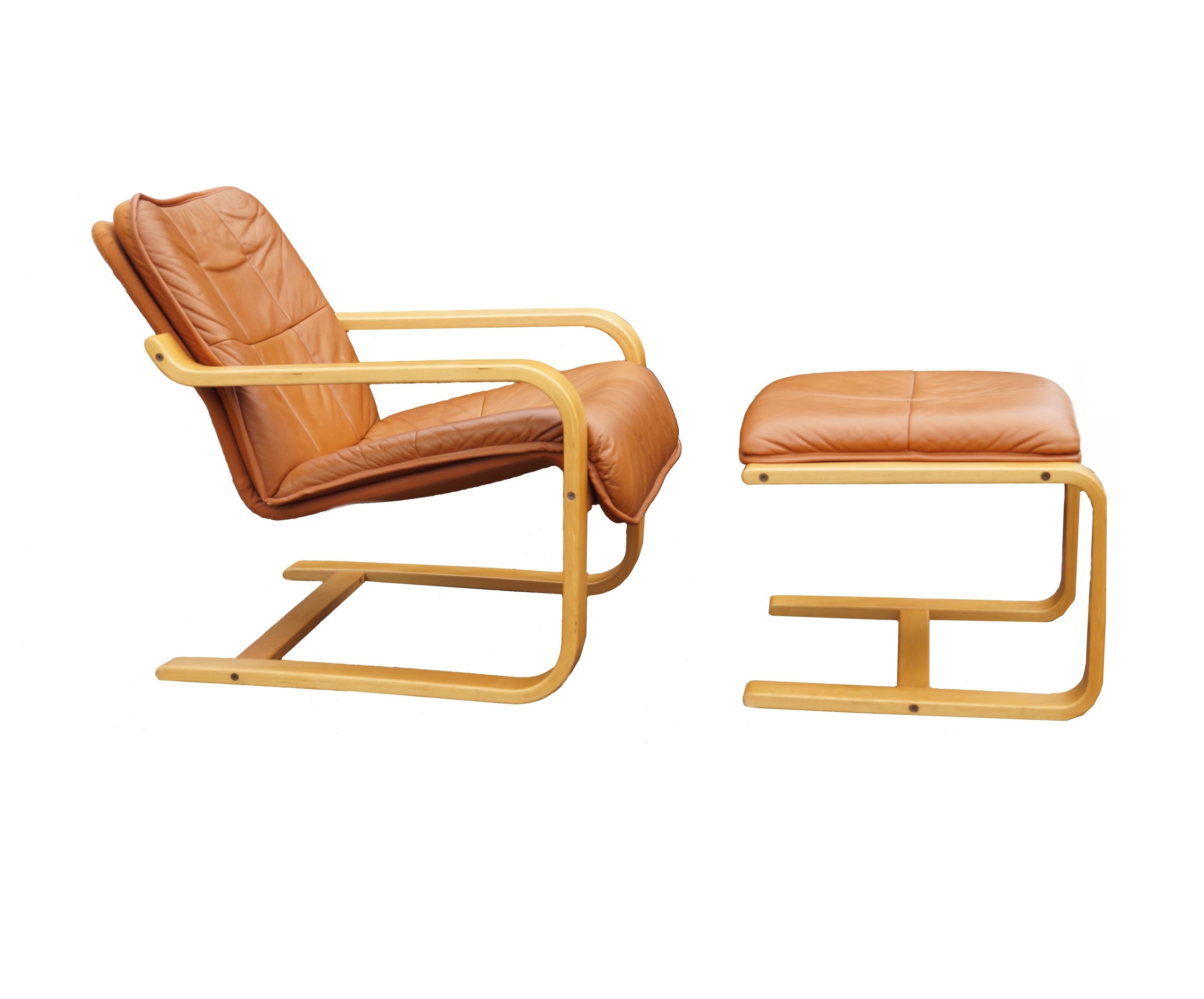 Finish leather and Bent wood Lounge Chair & Ottoman Mid-Century Modern by OY BJ Dahlqvist AB Finland . The ottoman measures 17